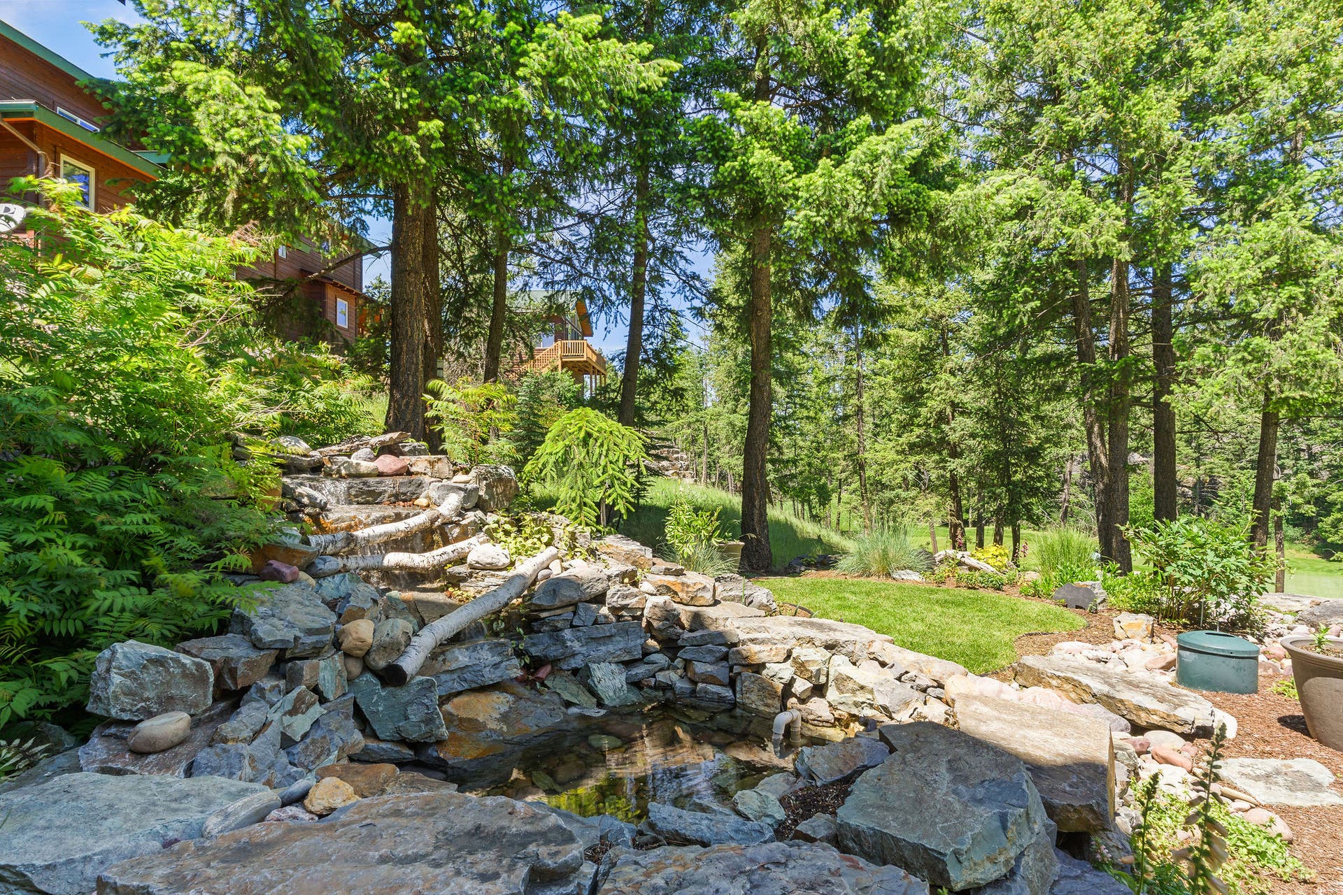 129 Bjork Drive, Bigfork, MT 59911 Fountain off of lower level rec room exit