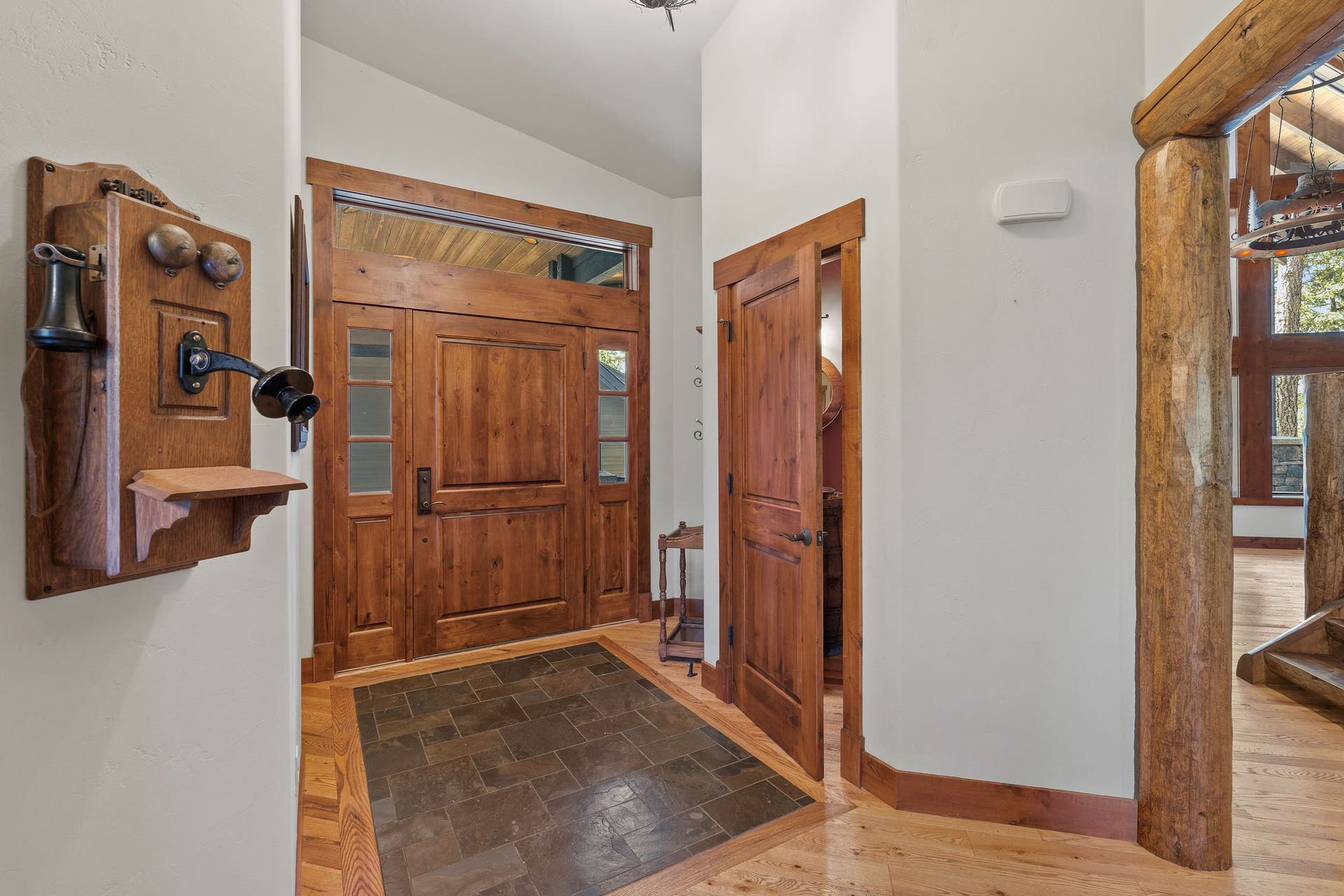 129 Bjork Drive, Bigfork, MT 59911 Tile inlay, knotty alder door, log features