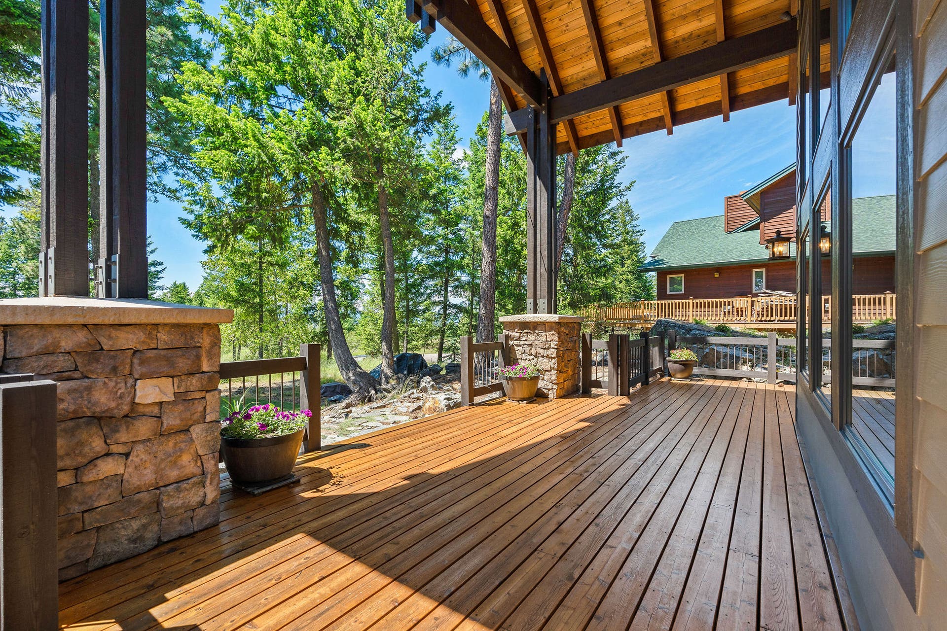 129 Bjork Drive, Bigfork, MT 59911 Covered deck off living room