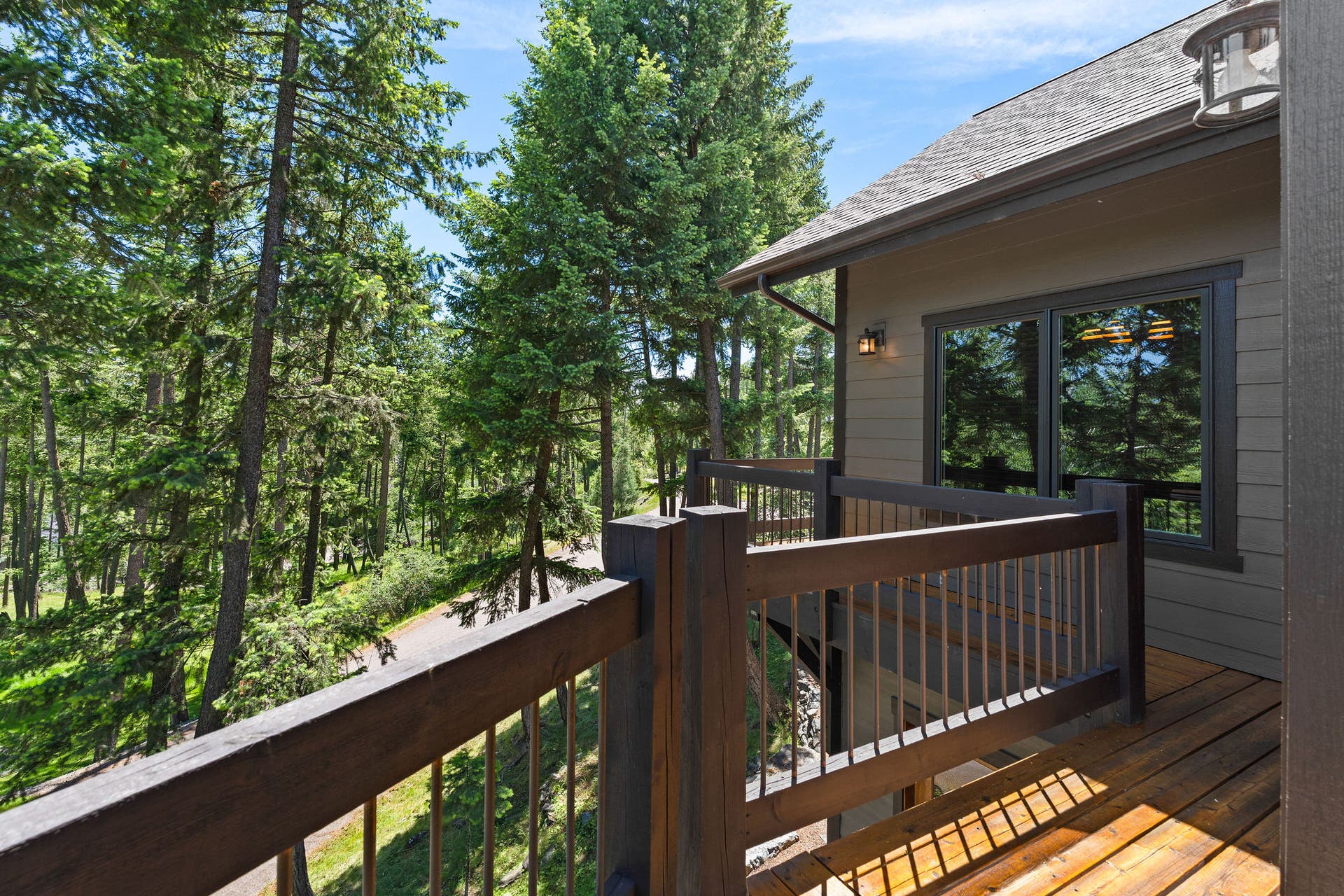 129 Bjork Drive, Bigfork, MT 59911 Deck by office window & dining area
