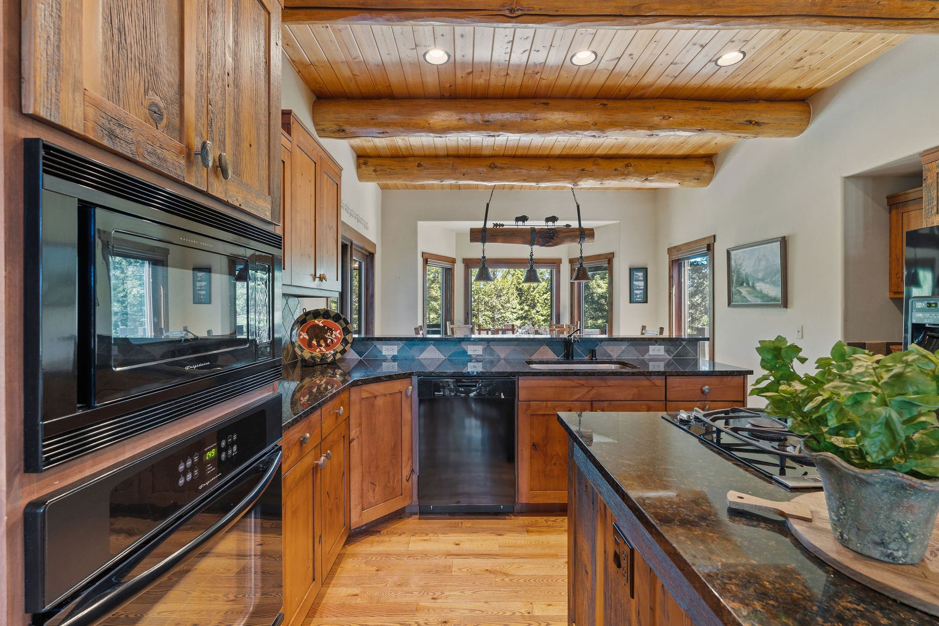 129 Bjork Drive, Bigfork, MT 59911 Hardwood flooring, granite bar top with seating