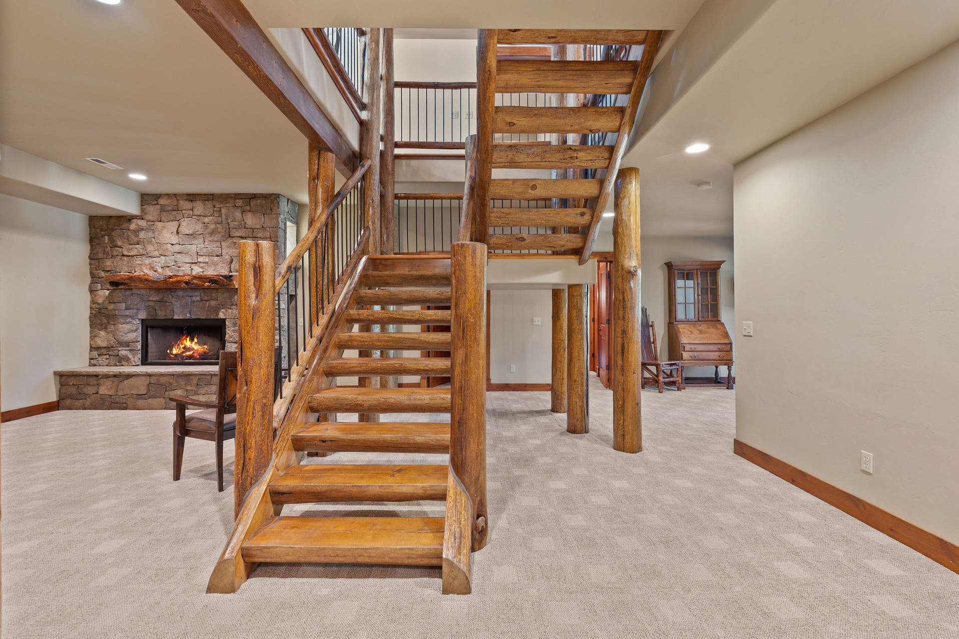 129 Bjork Drive, Bigfork, MT 59911 Rock fireplace with chimney firewood mantle & large hearth