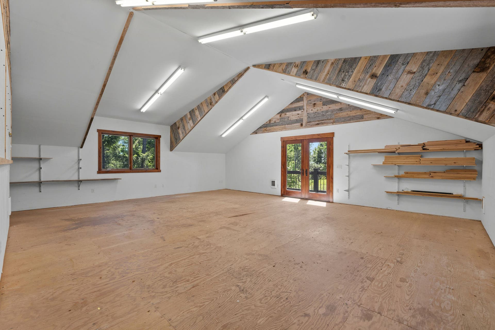 129 Bjork Drive, Bigfork, MT 59911 Vaulted ceiling, double doors to balcony