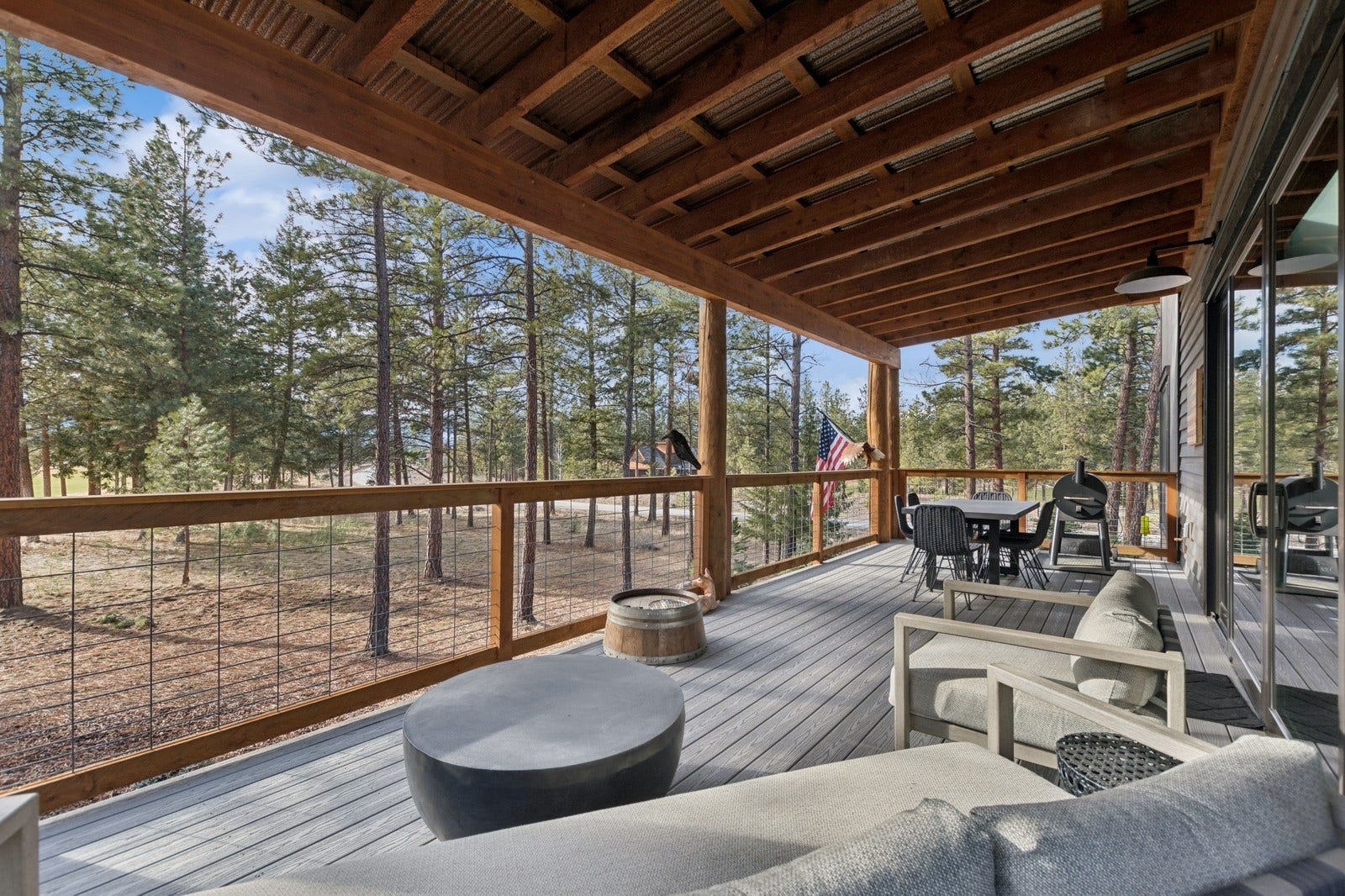30 Boulder Lane, Eureka, MT 59917 Wooden terrace with outdoor dining area