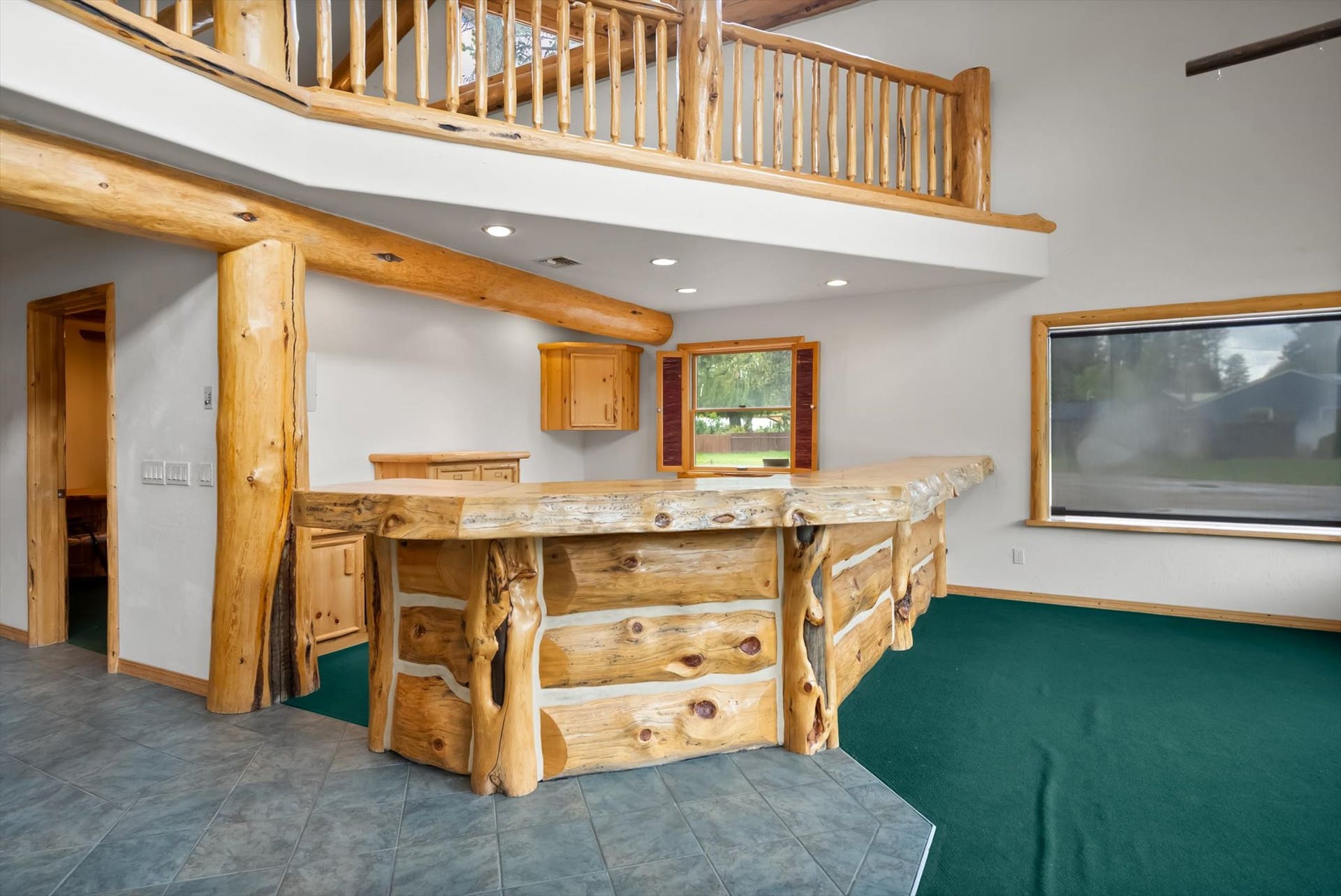 Reception desk.  Amazing Log accents:  Lodgepole, Mountain Maple, Diamond Willow and Haida wood details.