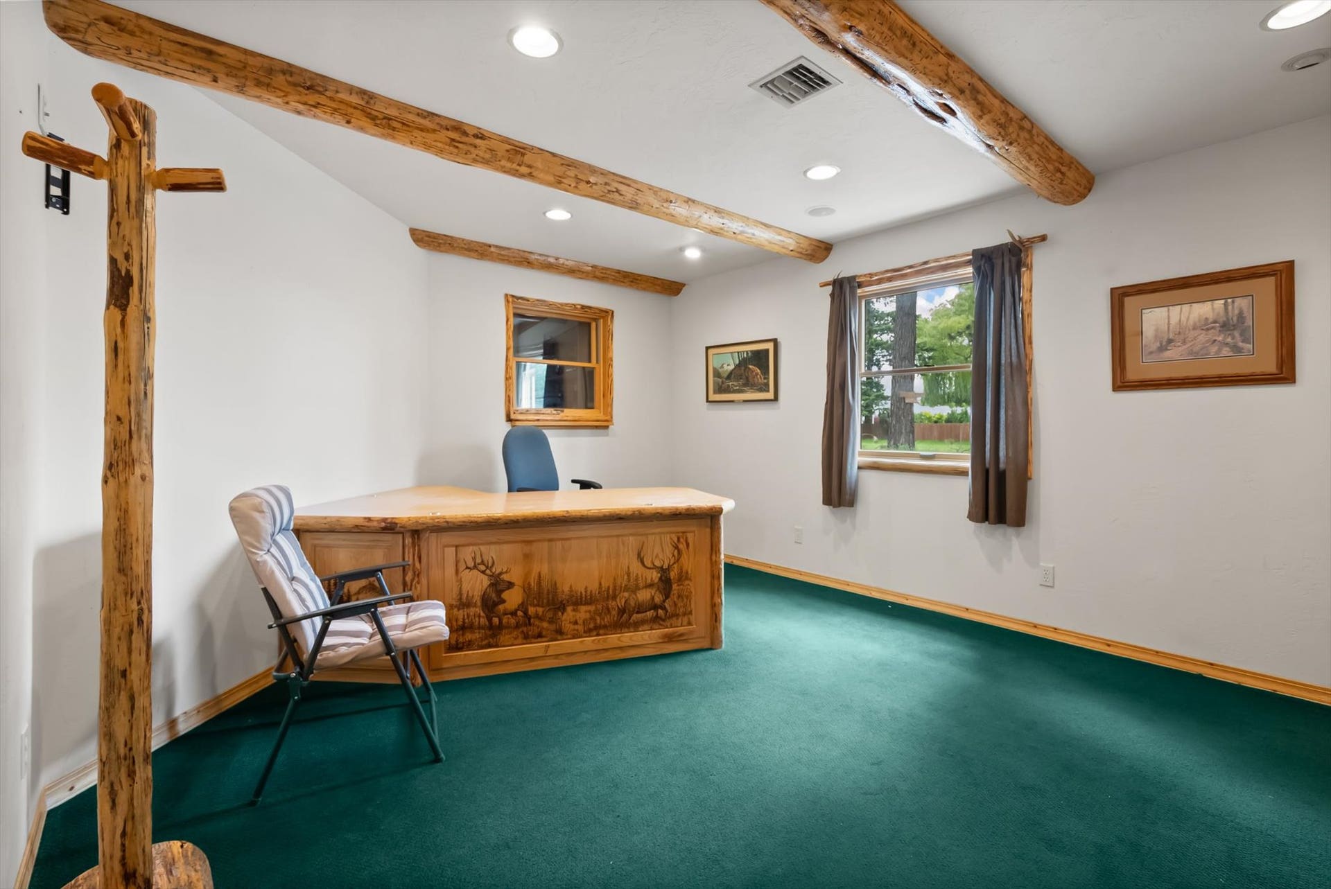 Private office with custom desks behind reception area (available)