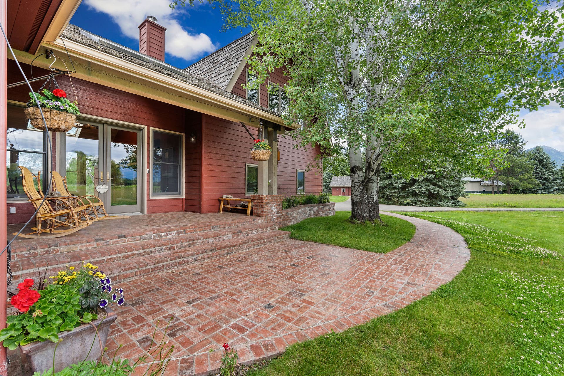 1160 Swan Horseshoe Drive, Bigfork, MT 59911 Shaded and welcoming entrance