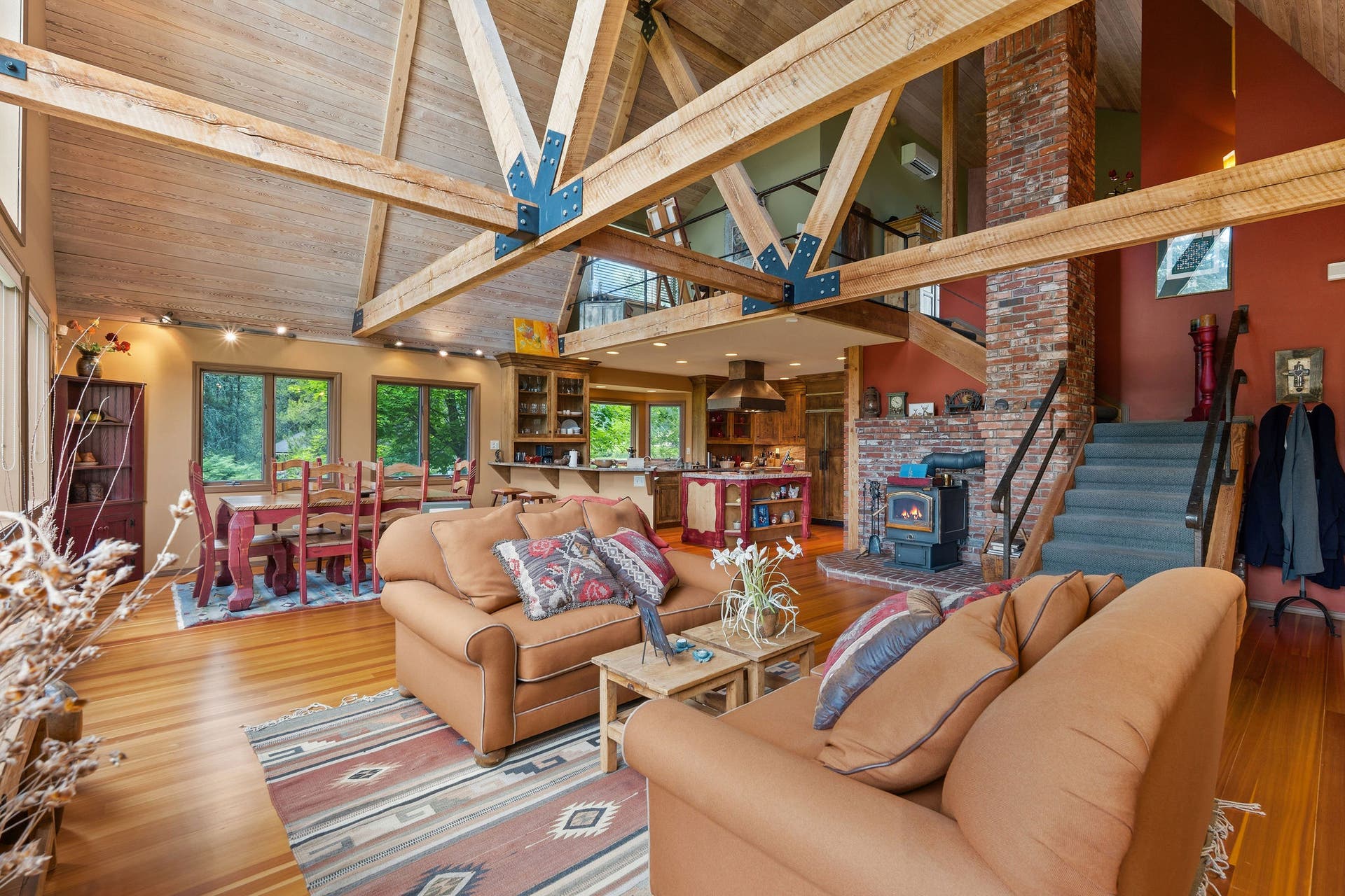 1160 Swan Horseshoe Drive, Bigfork, MT 59911 Living room, dining, kitchen areas that all flow together