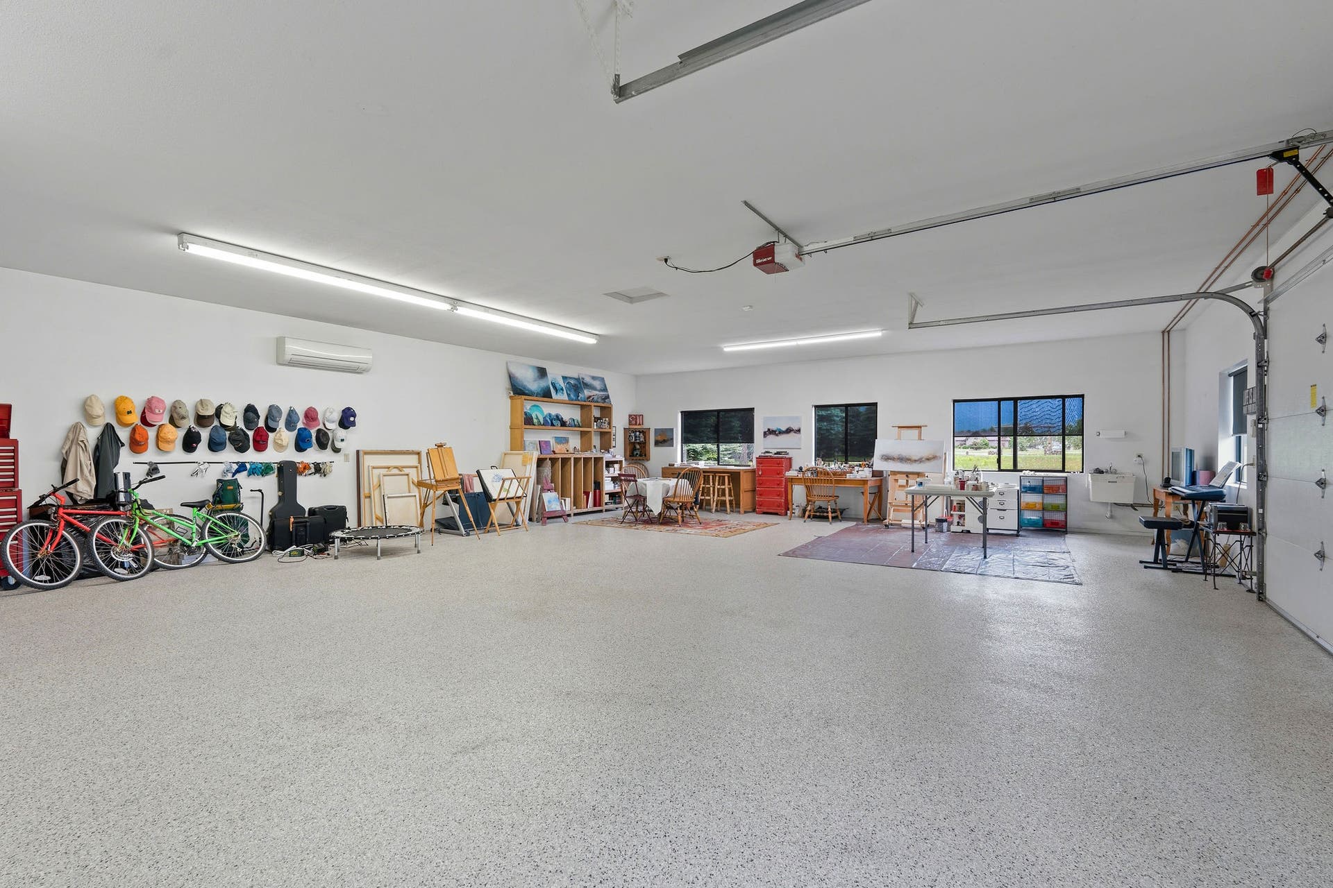 1160 Swan Horseshoe Drive, Bigfork, MT 59911 5 car garage, with an art studio space and epoxy floors.