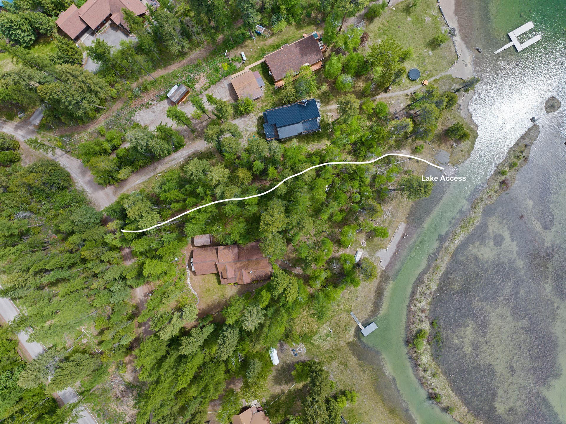 13404 Crescent Moon Drive, Bigfork, MT 59911 Birds-eye layout highlighting the direct community path to the lake access point