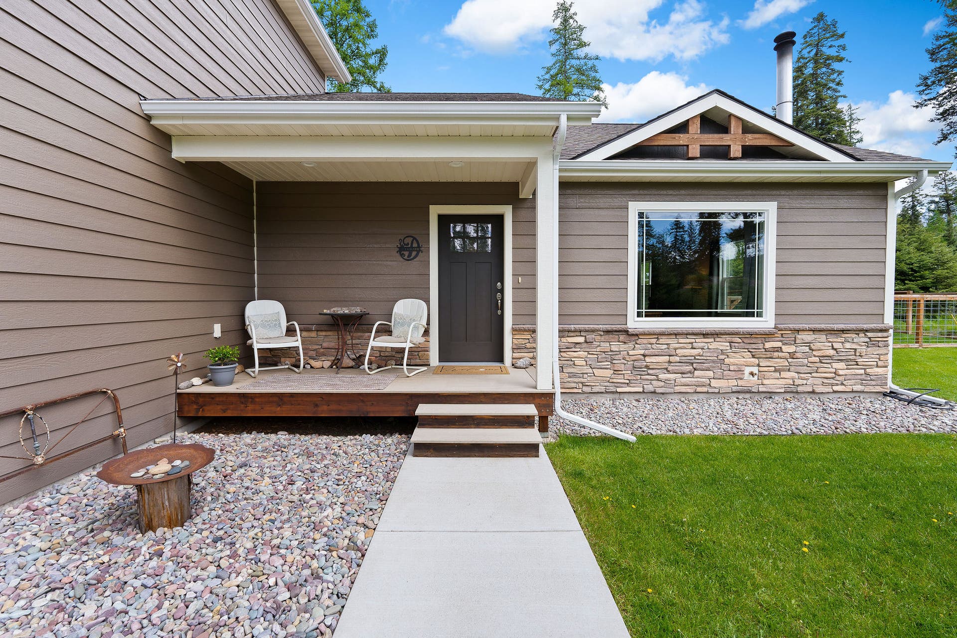 13404 Crescent Moon Drive, Bigfork, MT 59911 Welcoming covered front porch