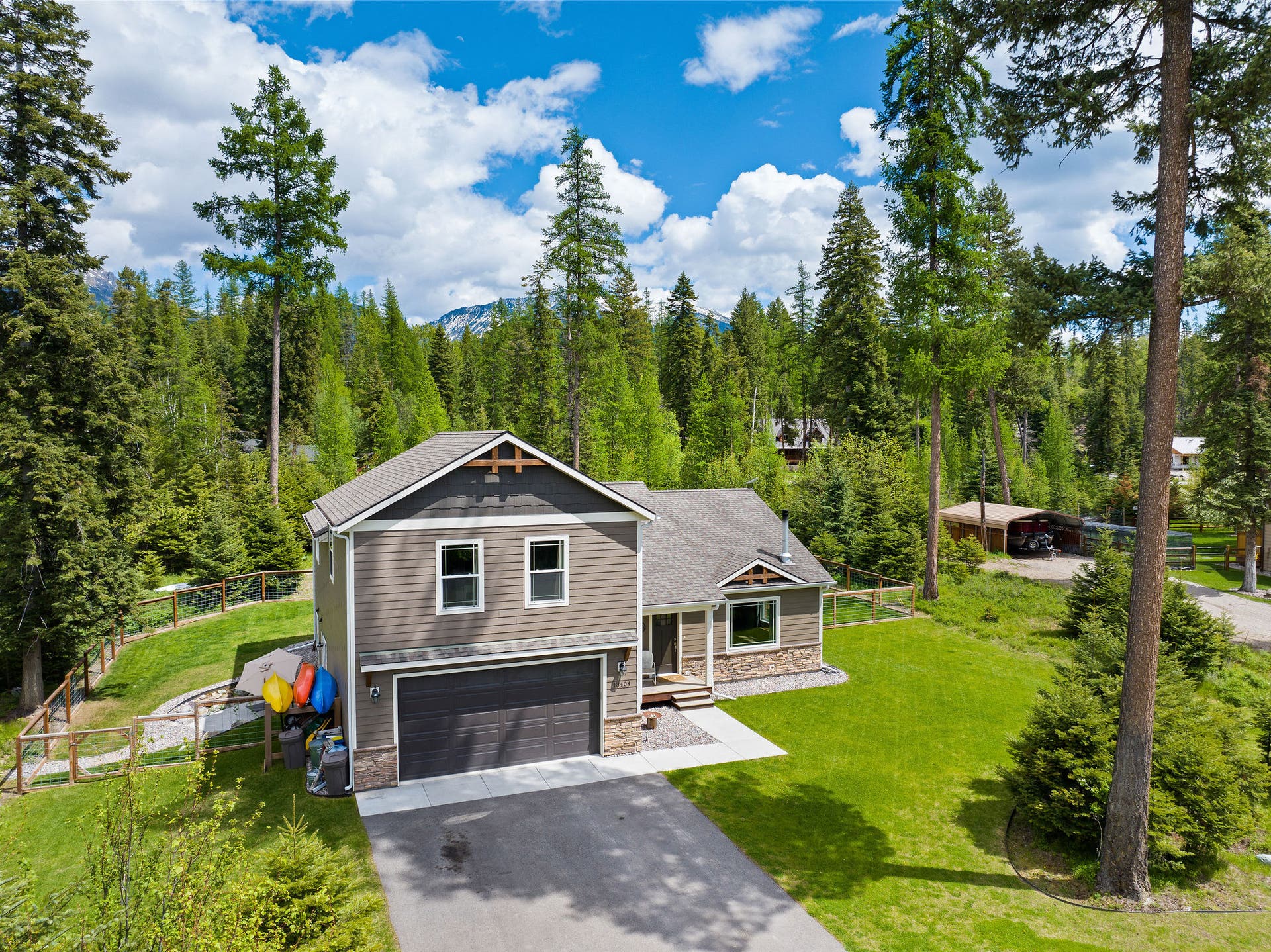 13404 Crescent Moon Drive, Bigfork, MT 59911 Elevated view highlighting the peaceful and serene forest surroundings