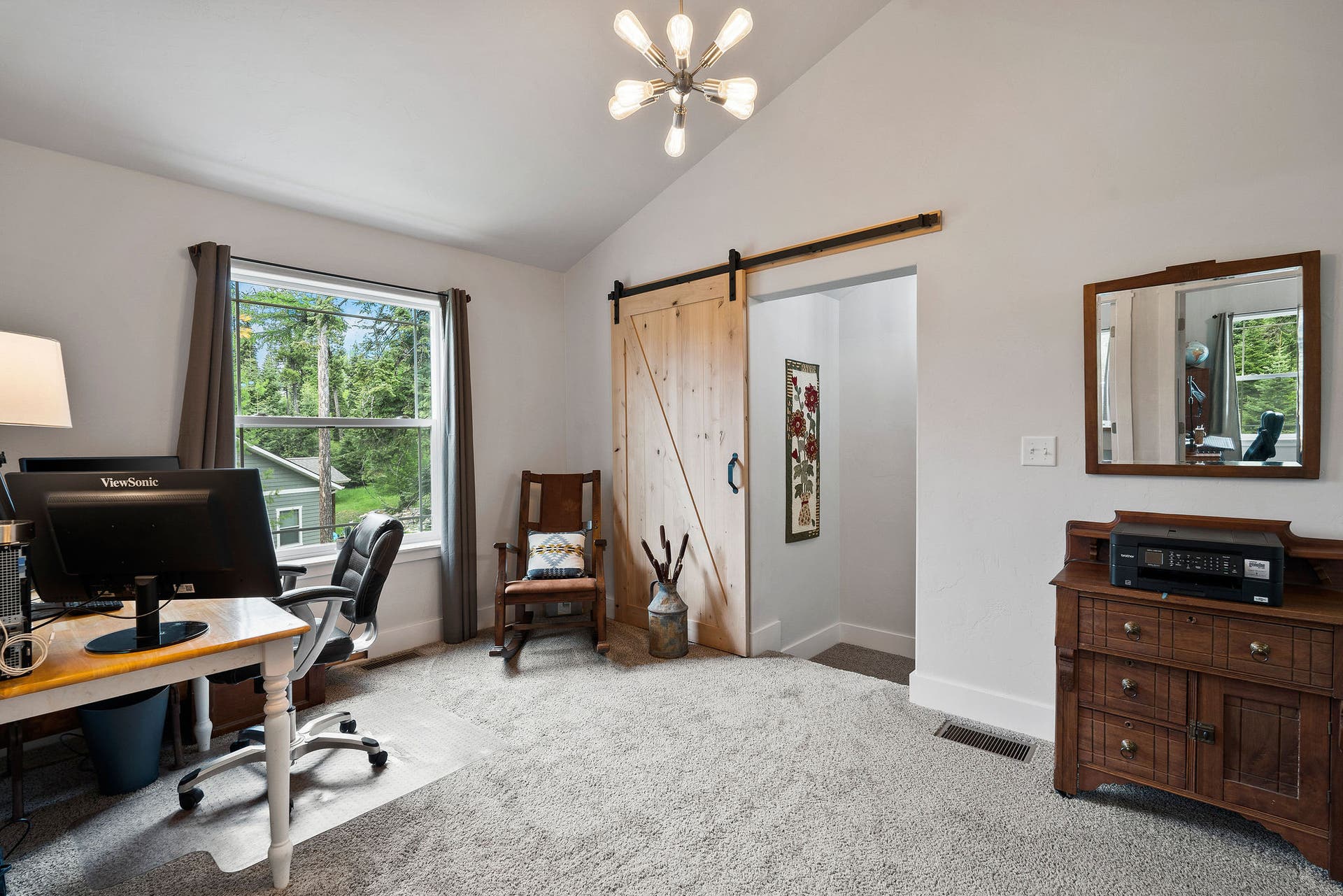 13404 Crescent Moon Drive, Bigfork, MT 59911 Versatile third-level loft space ideal for a home office or media room