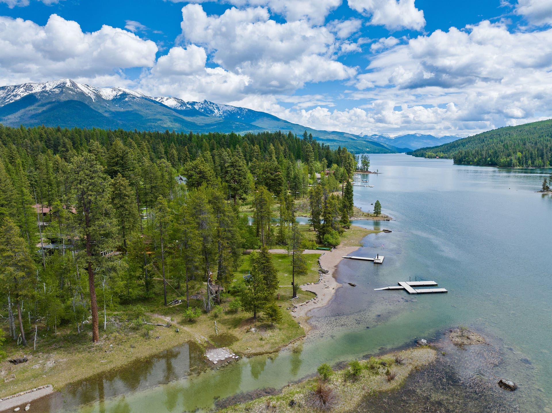 13404 Crescent Moon Drive, Bigfork, MT 59911 Serene lake access and beach area perfect for launching boats or swimming