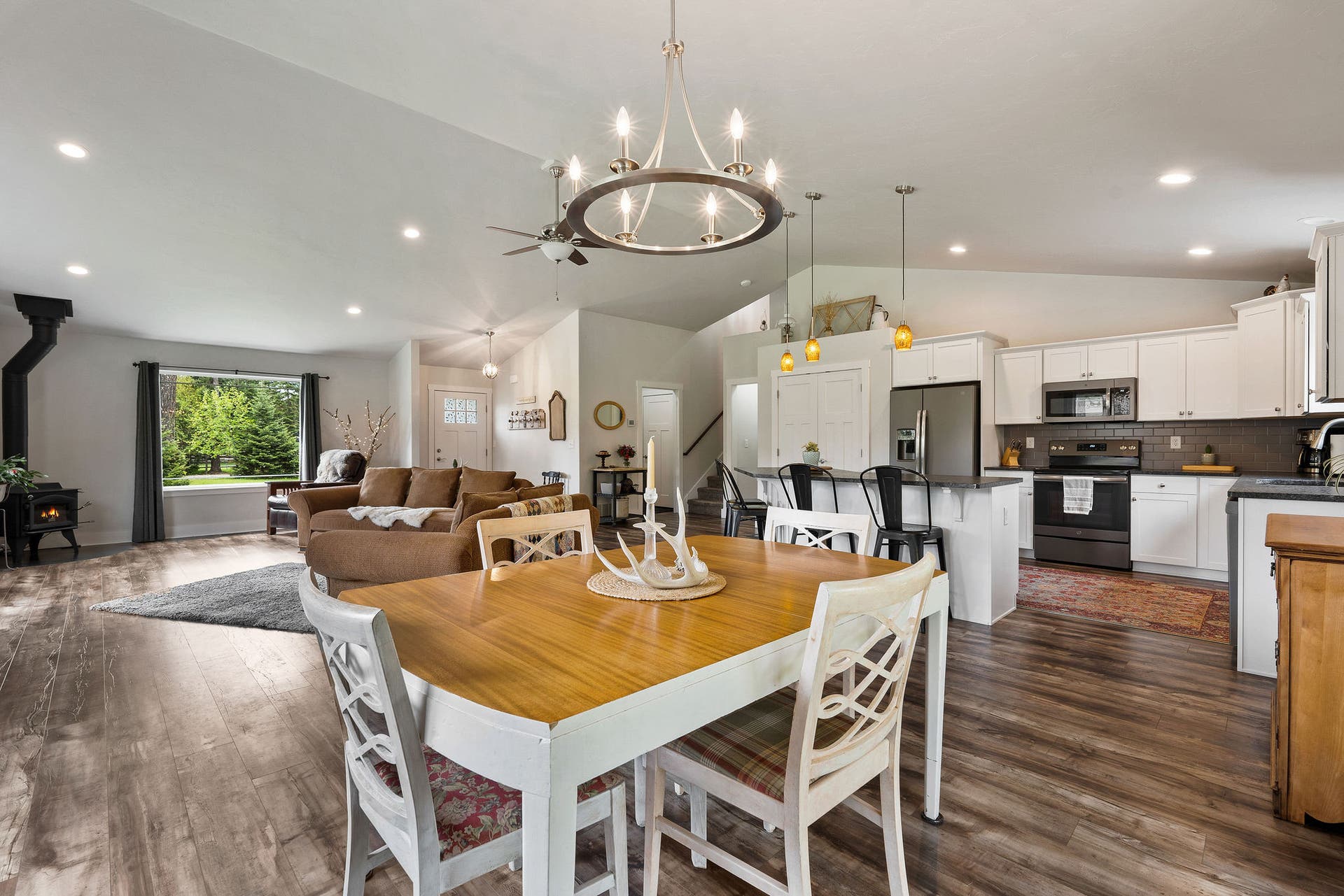 13404 Crescent Moon Drive, Bigfork, MT 59911 Wonderful view from the dining room emphasizing the bright and flowing floor plan