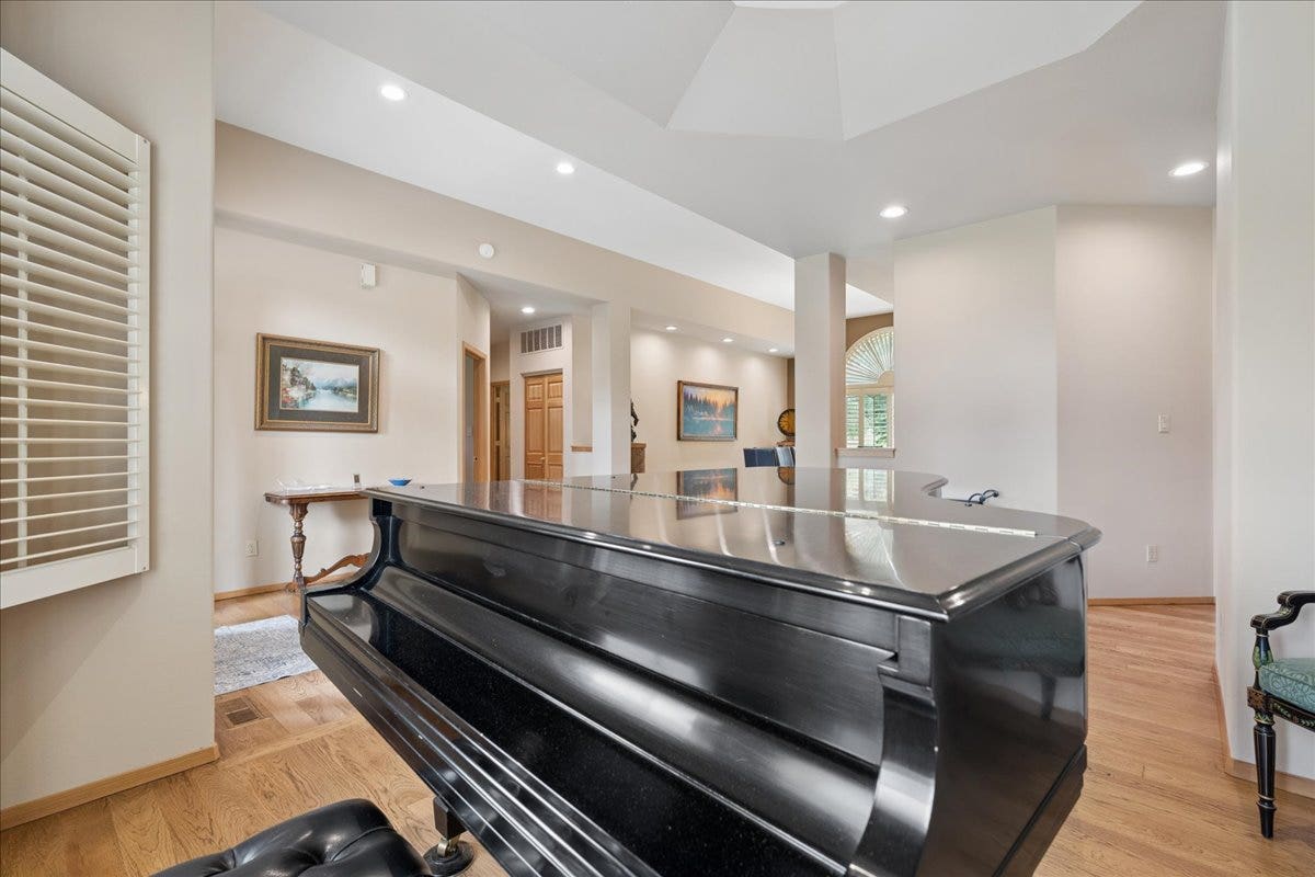 View from sitting area looking towards entry and formal dining