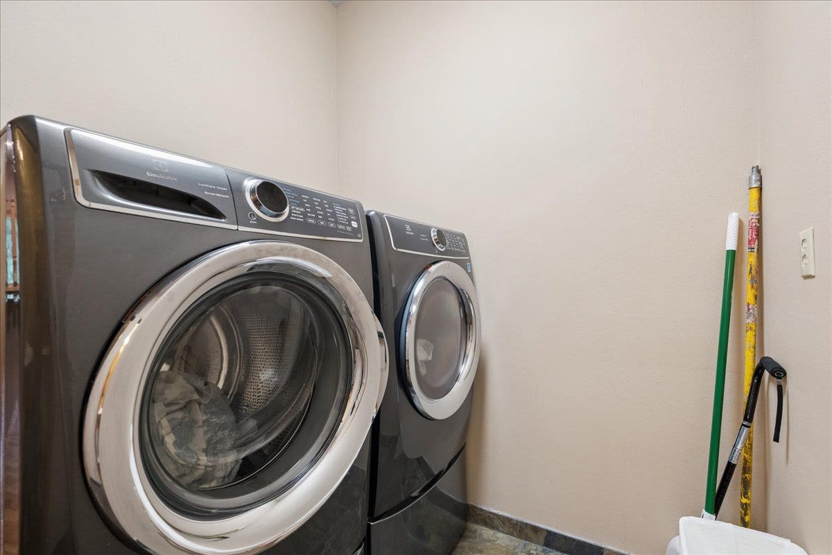 Laundry room with washer and dryer.