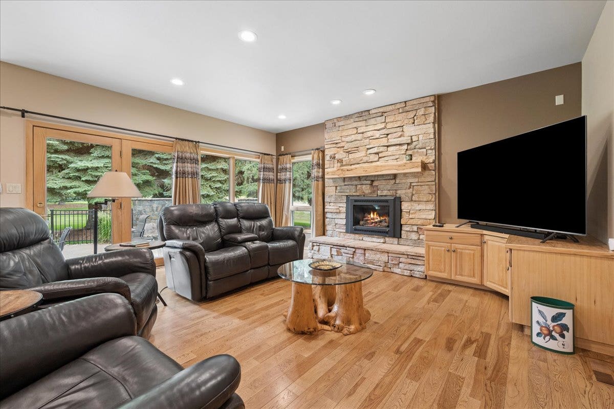 Living room with access to backyard patio