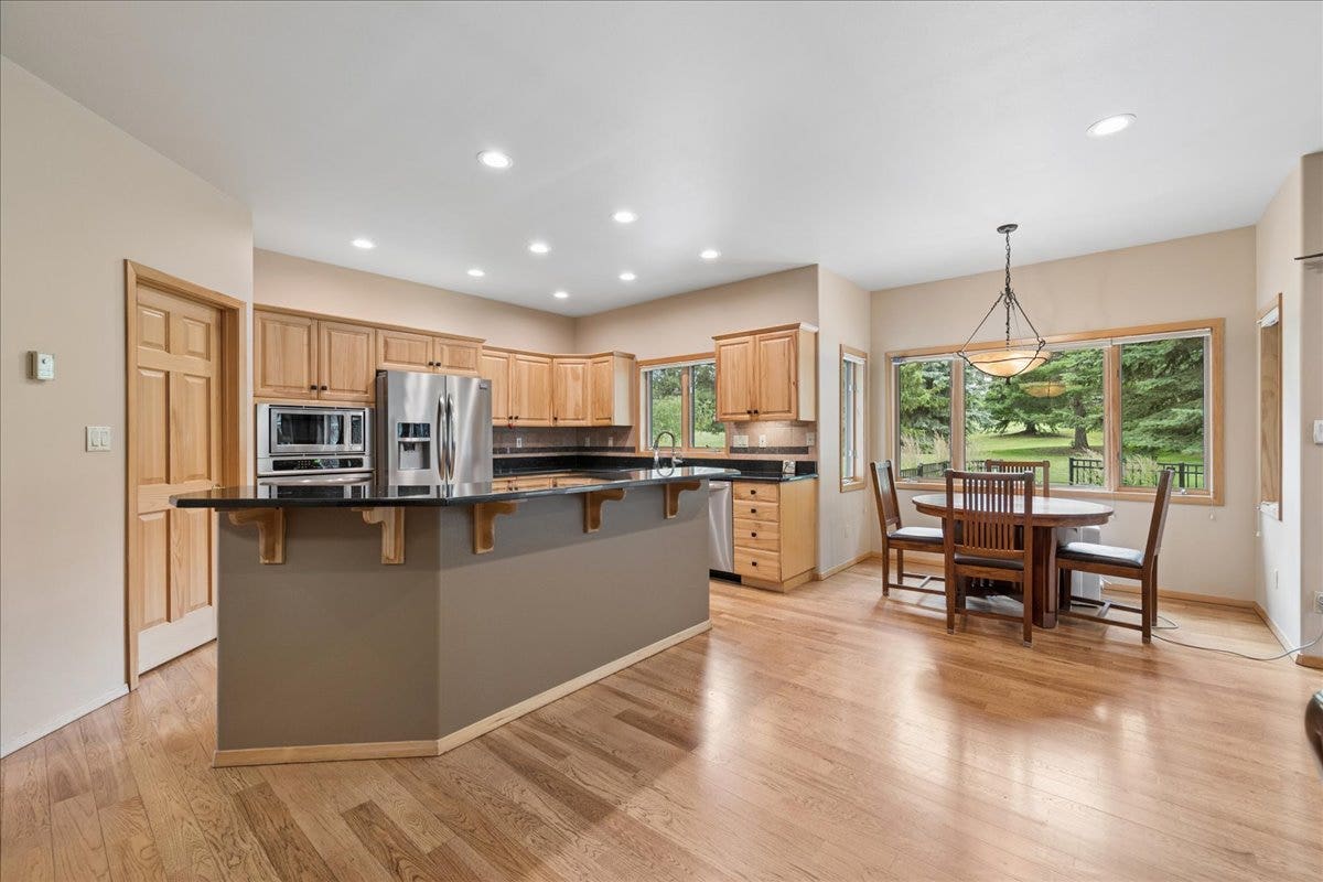 Kitchen includes a pantry and breakfast nook nearby