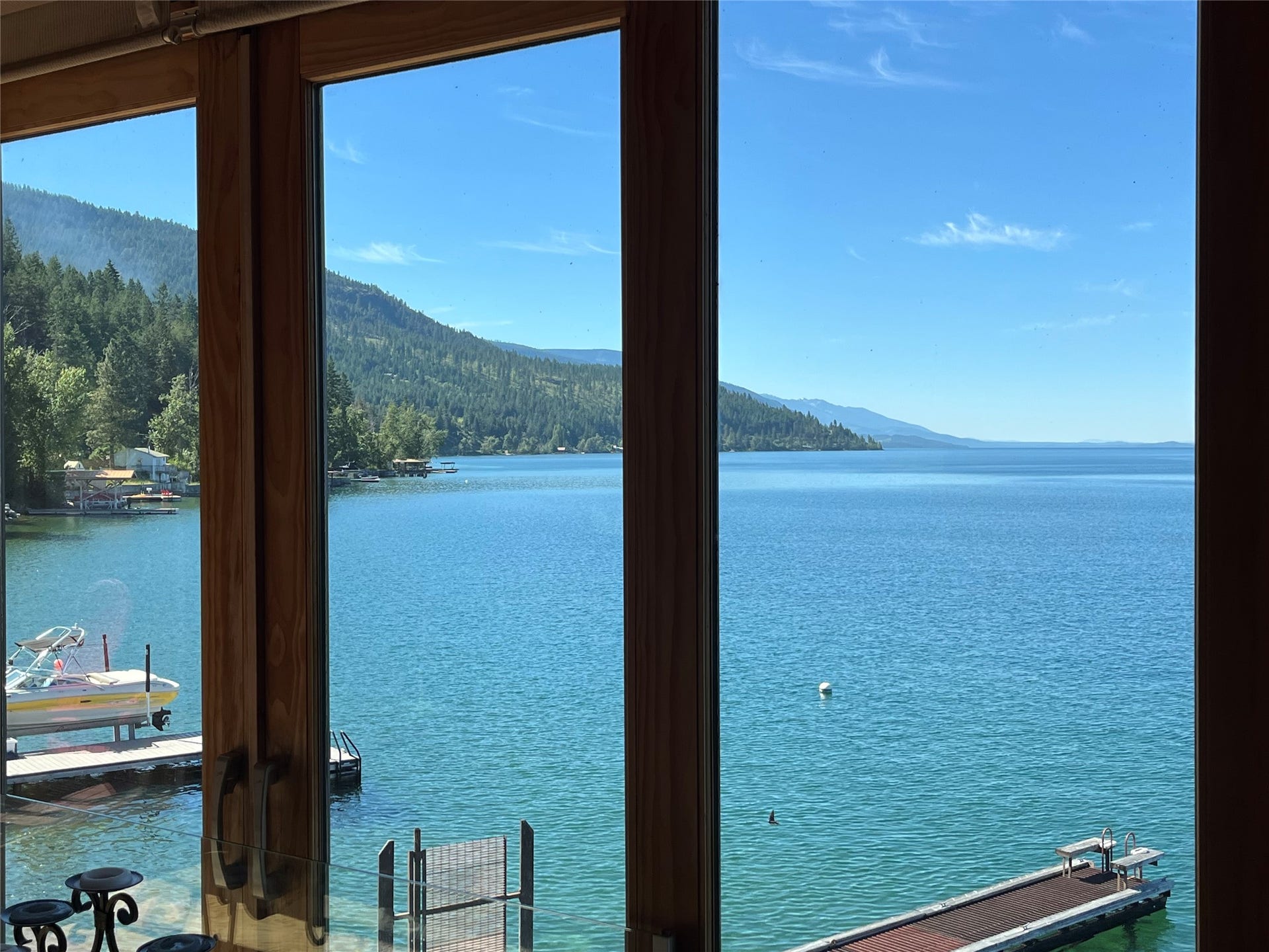 15335 MT Highway 35, Bigfork, MT 59911 Expansive window framing Flathead Lake.