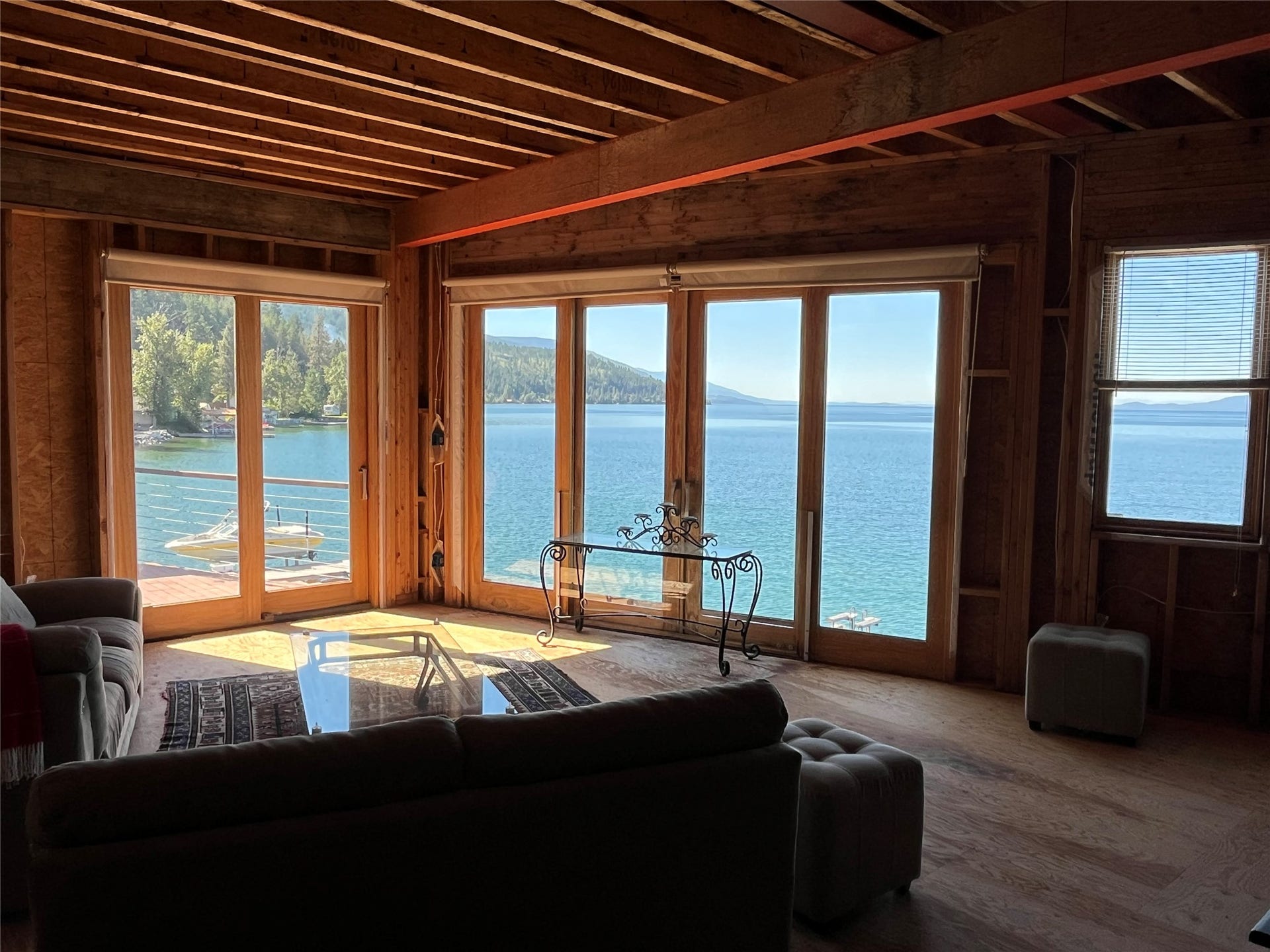 15335 MT Highway 35, Bigfork, MT 59911 Open-plan interior with stunning lake views