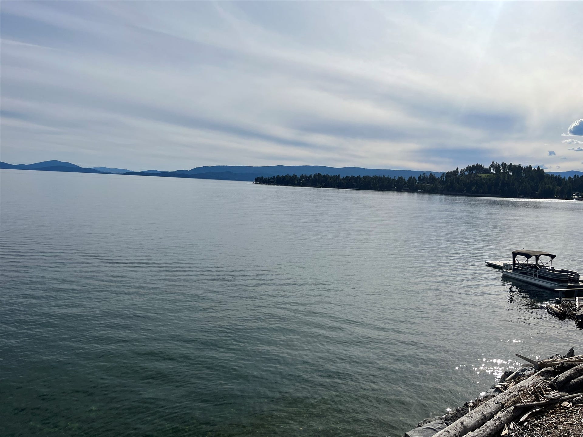 15335 MT Highway 35, Bigfork, MT 59911 Expansive lakefront with a private boat dock.