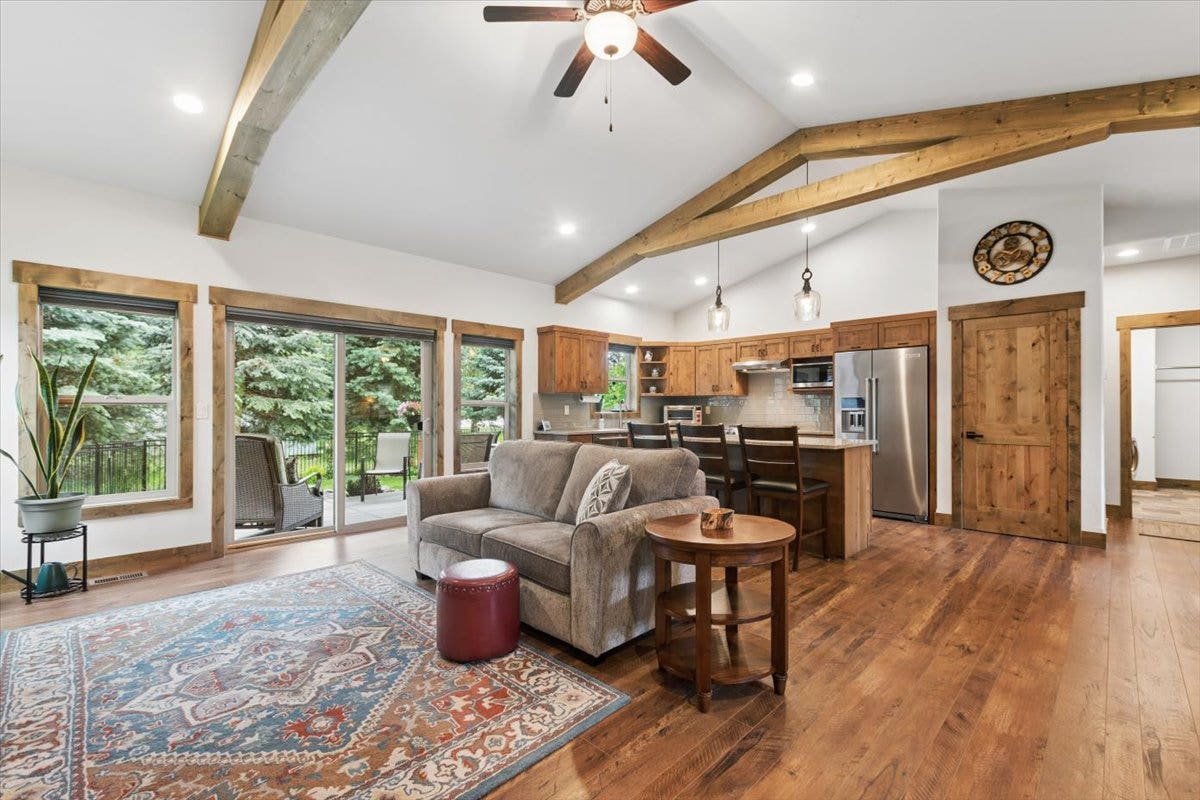 236 Bluebunch Court, Bigfork, MT 59911 Living room with sliding door to patio and back yard