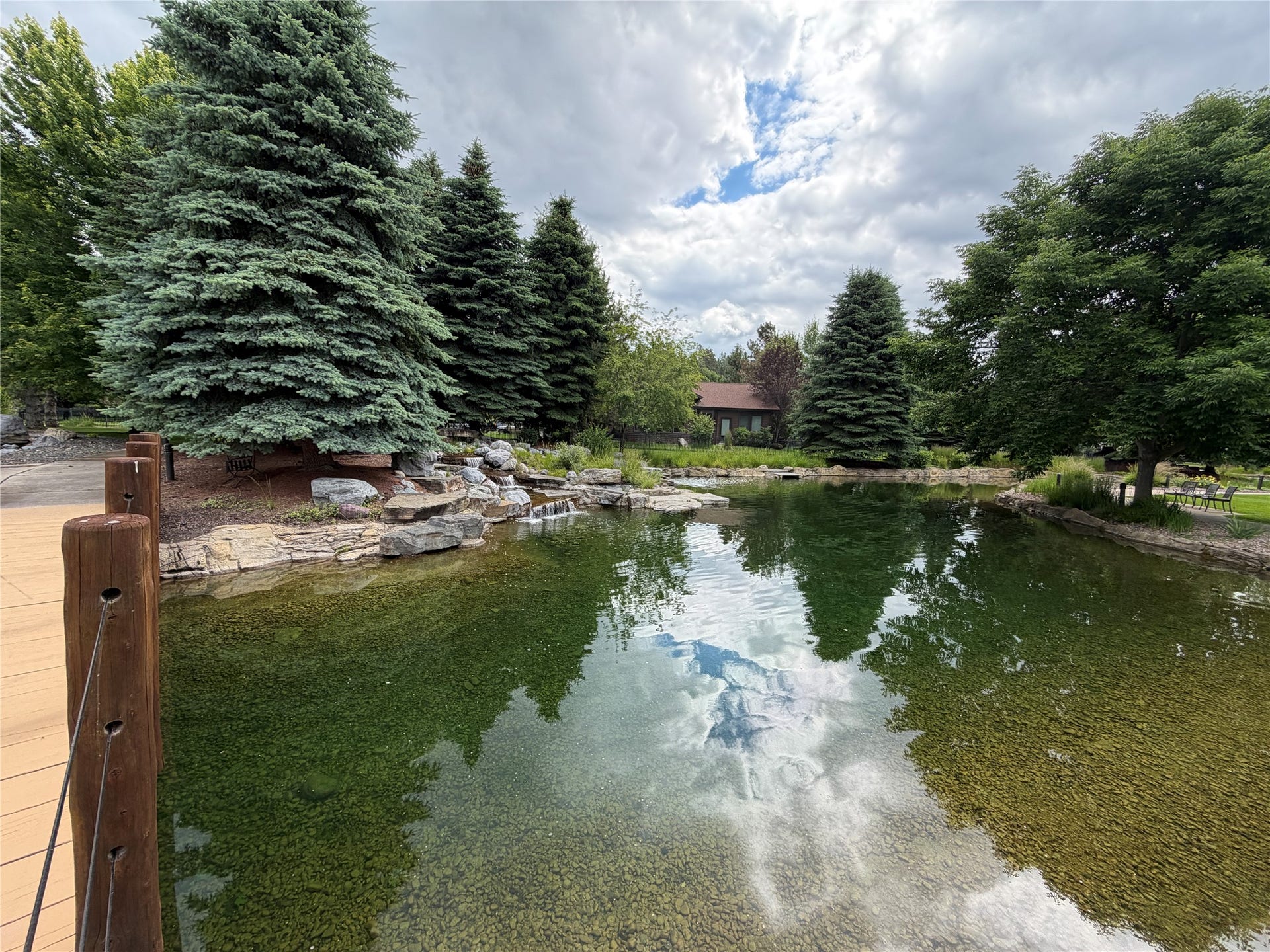 236 Bluebunch Court, Bigfork, MT 59911 Walking the bridge over the pond