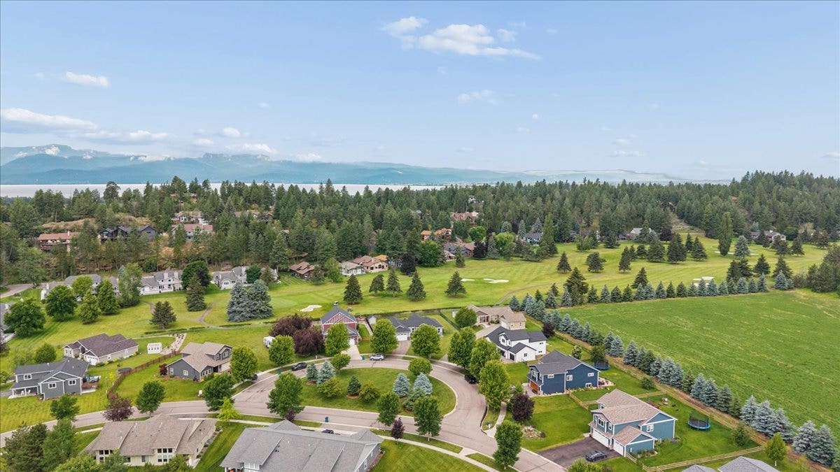 615 Mill Pond Place, Bigfork, MT 59911 Adjacent to Eagle Bend Golf Course and close to Flathead Lake