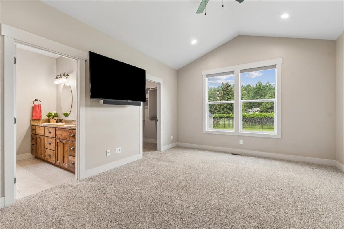615 Mill Pond Place, Bigfork, MT 59911 Primary bedroom with private bath and walk-in closet