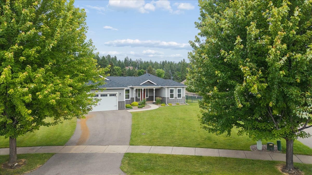 615 Mill Pond Place, Bigfork, MT 59911 Beautiful tree lined driveway