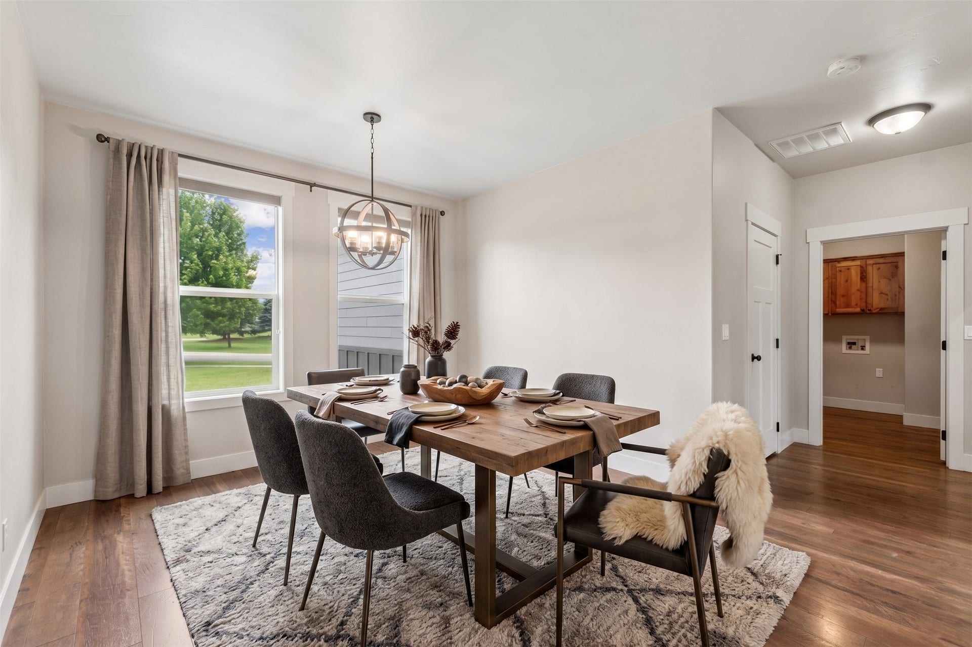 615 Mill Pond Place, Bigfork, MT 59911 Virtually staged dining area