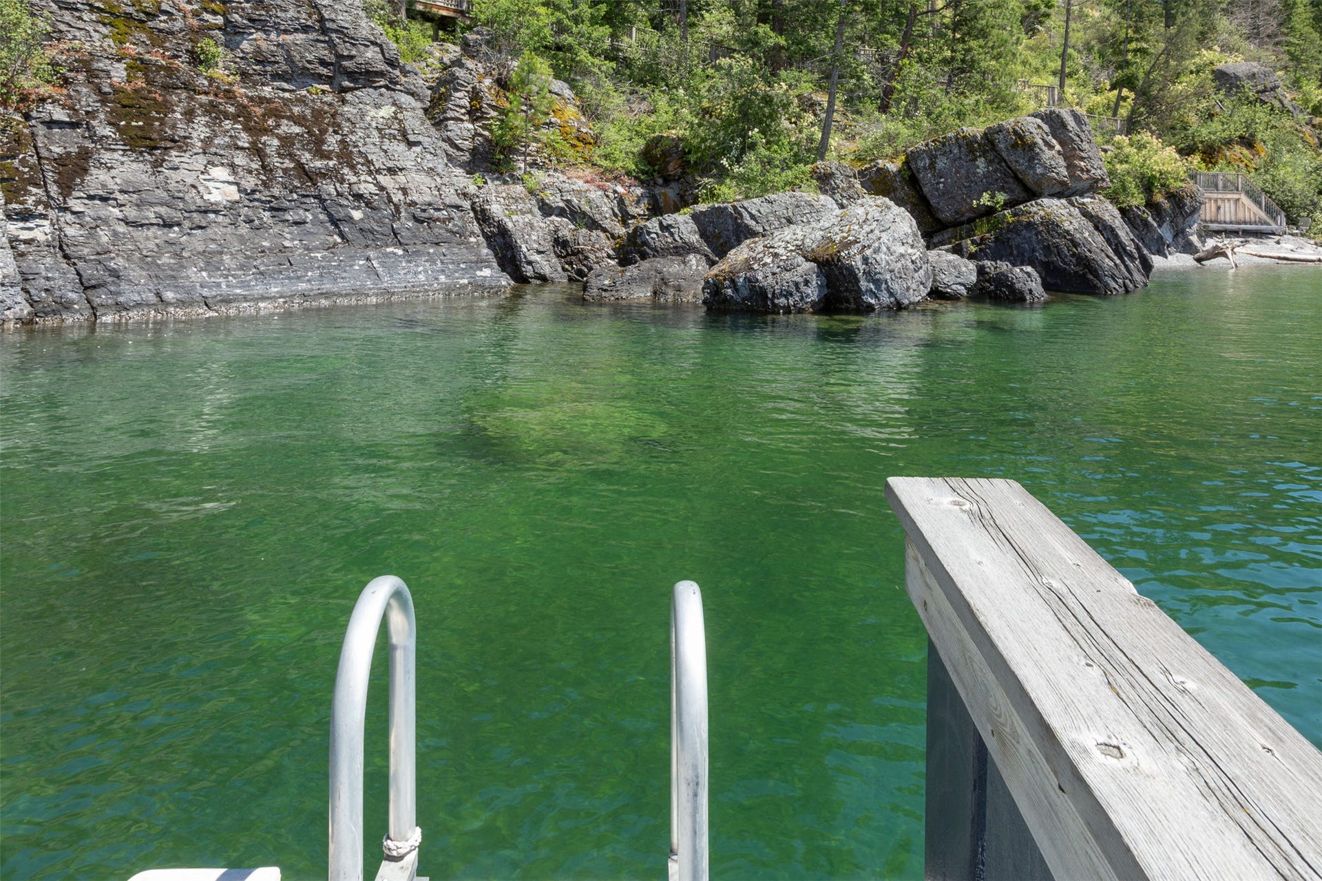 A nice deep swimming hole is sheltered by the boat house. Bring your kayak, canoe or wave runner!