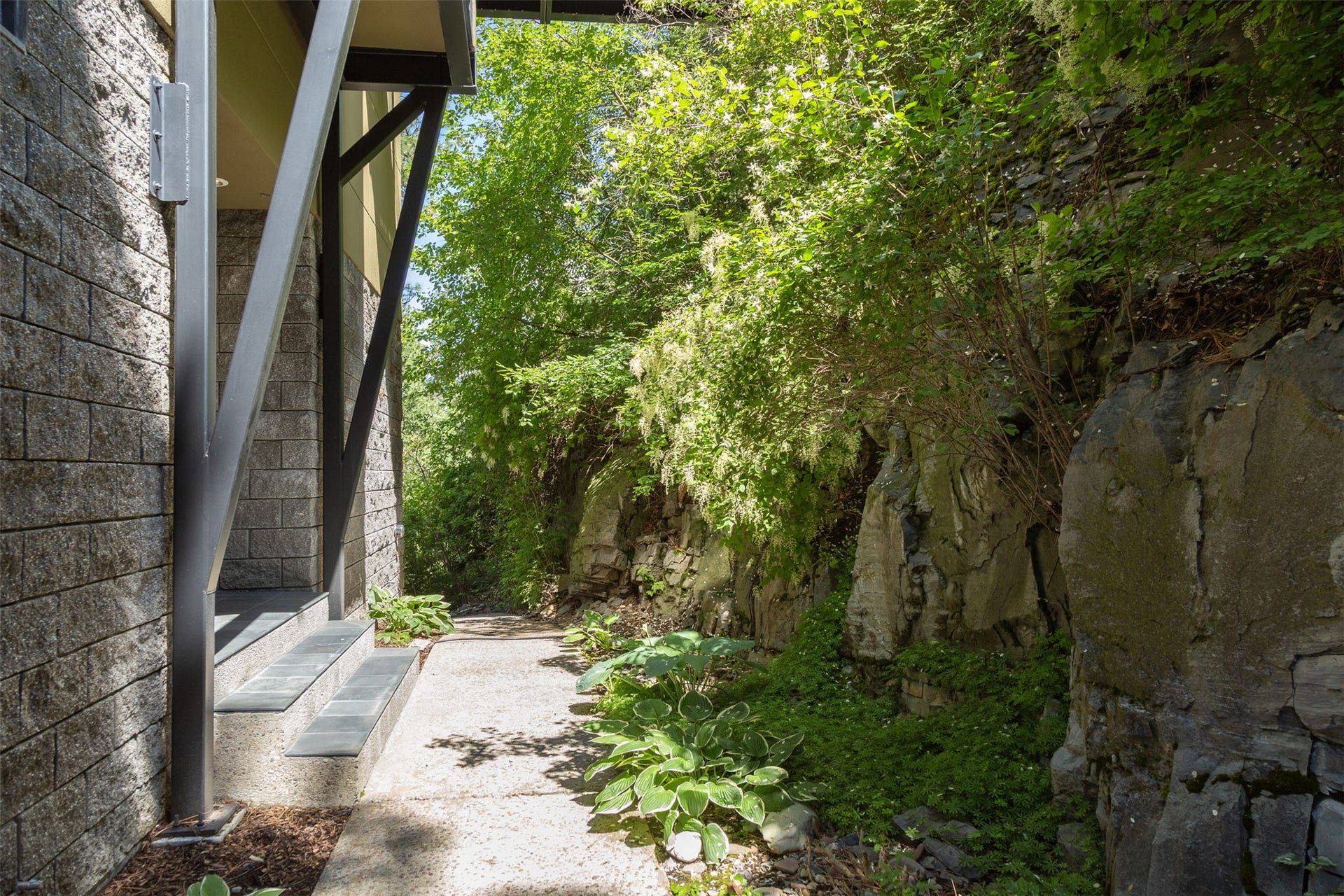 Lower level access to the home. Also for access to the waterfront walkway and lower level decks.