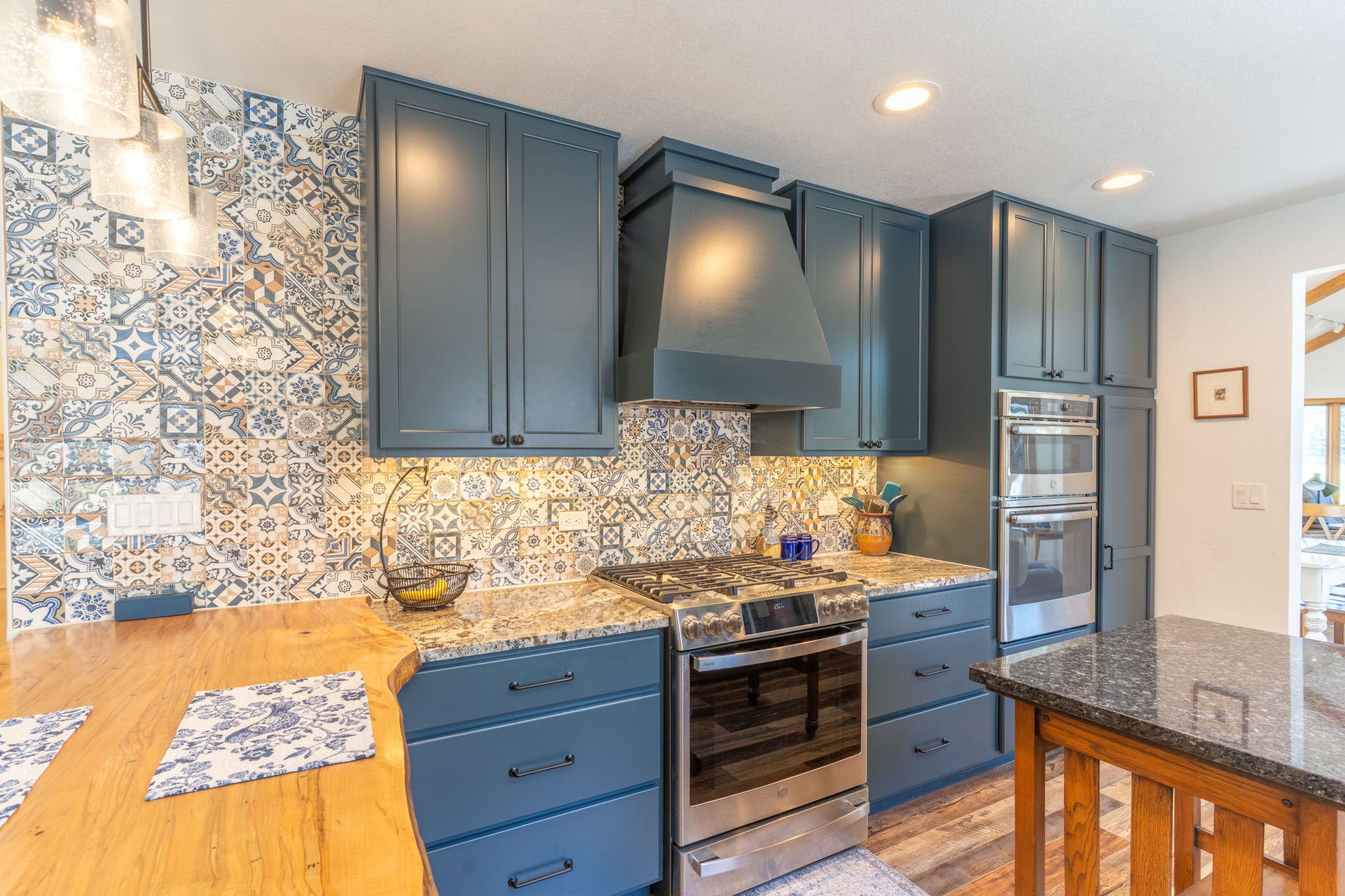 77 Golf Terrace, Bigfork, MT 59911 Custom cabinets, tile, live edge and granite counters and high end appliances