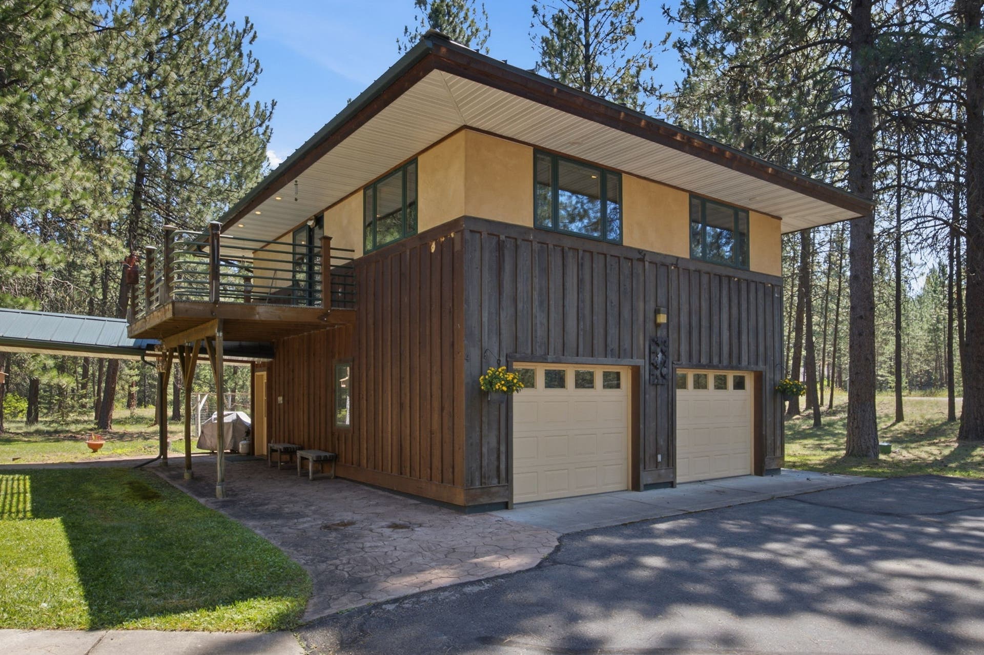 The thoughtfully designed accessory dwelling includes a private exterior entrance, allowing independent access without passing through the garage for added privacy and convenience.