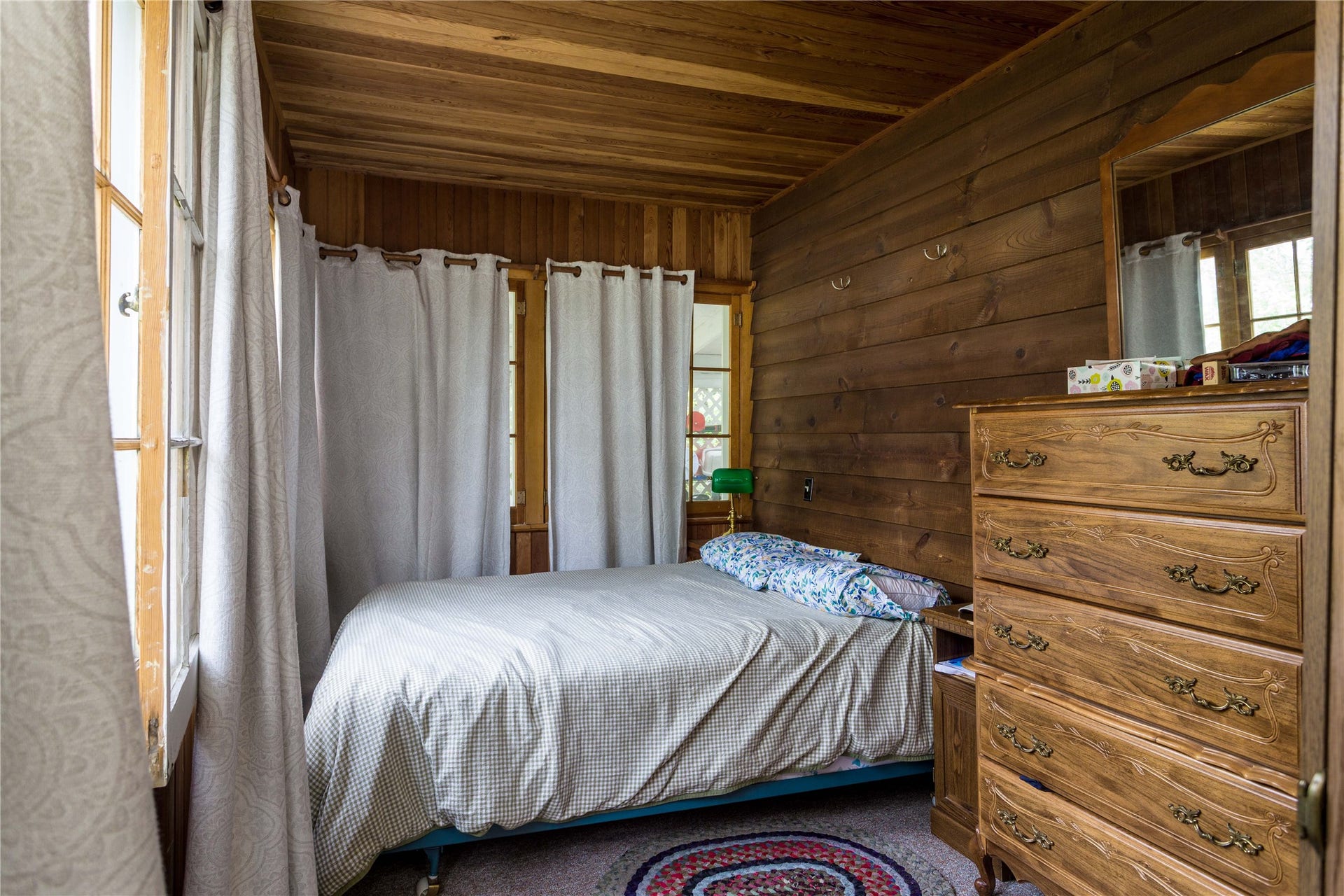 338 Flathead Lodge Road, Bigfork, MT 59911 Sleeping area in main cabin.