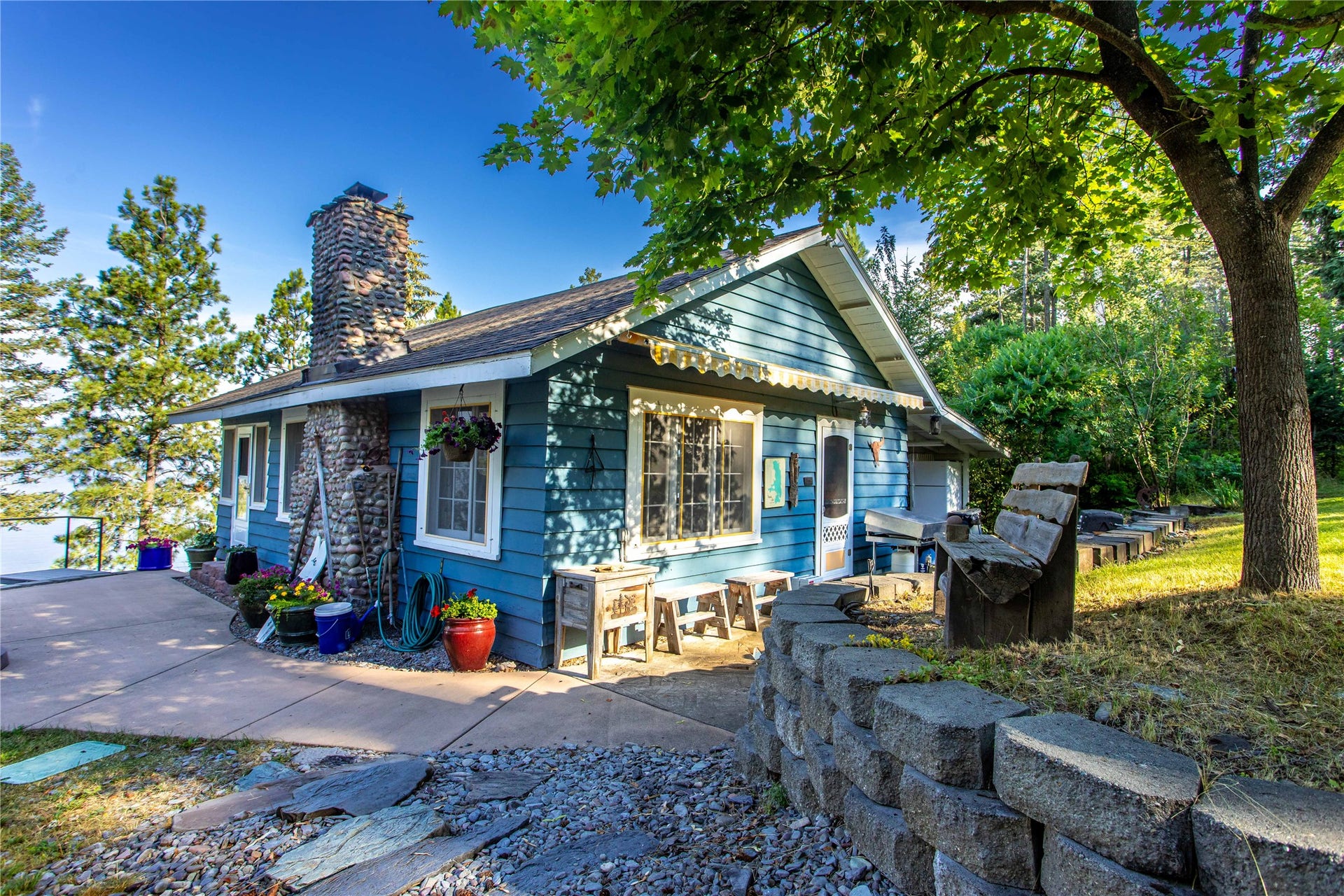 338 Flathead Lodge Road, Bigfork, MT 59911 Charming cabin, beautiful setting.
