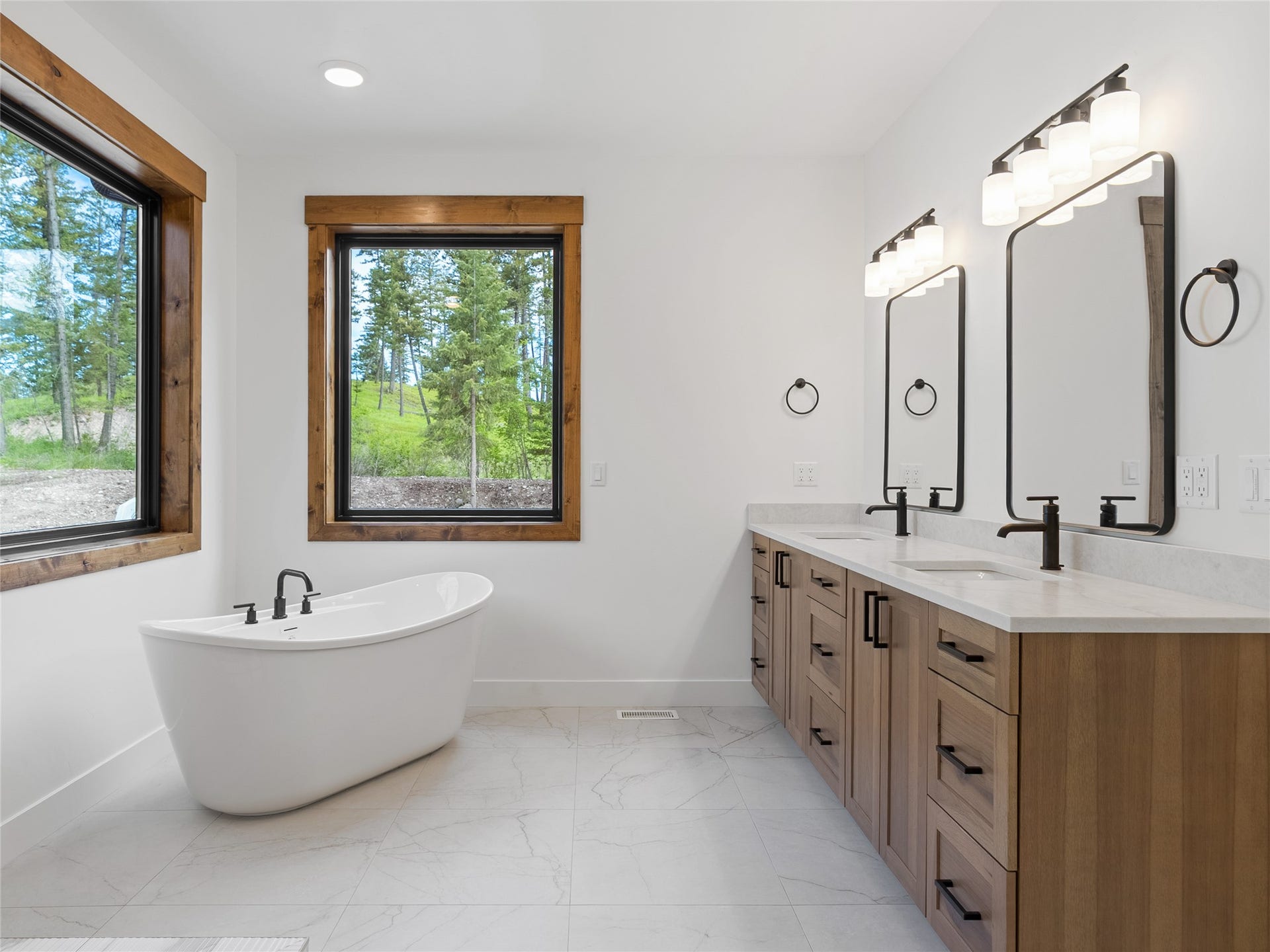 Photos shown are from a previously completed home by the same builder, featuring similar finishes and layout. Home is to be built.