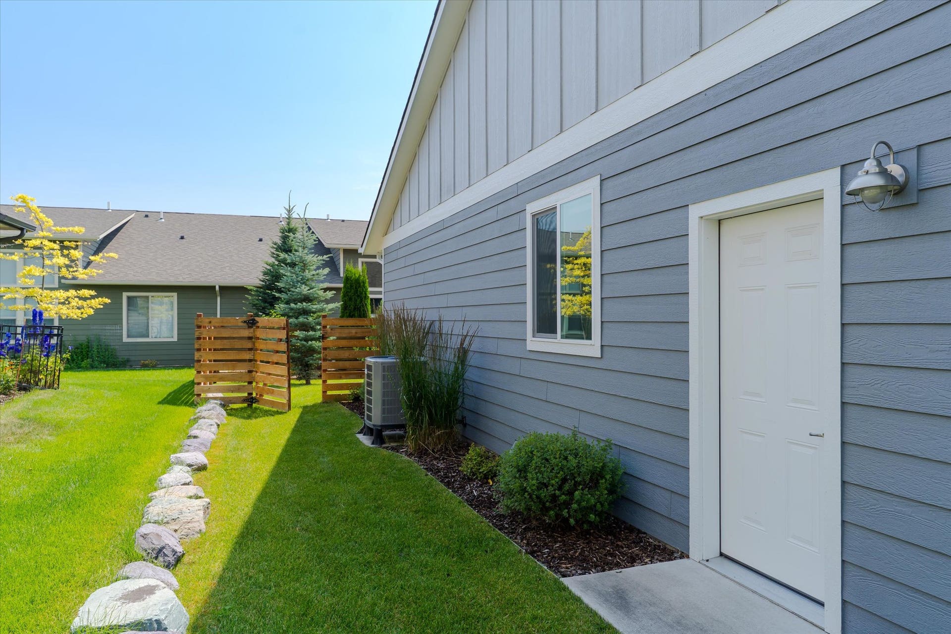 505 Skid Trail, Bigfork, MT 59911 Side yard with access gate to back yard