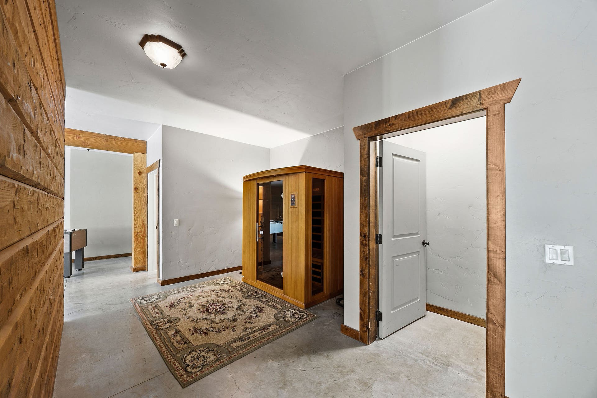 70 Big Cedar, Bigfork, MT 59911 Entrance to walk out basement area with sauna