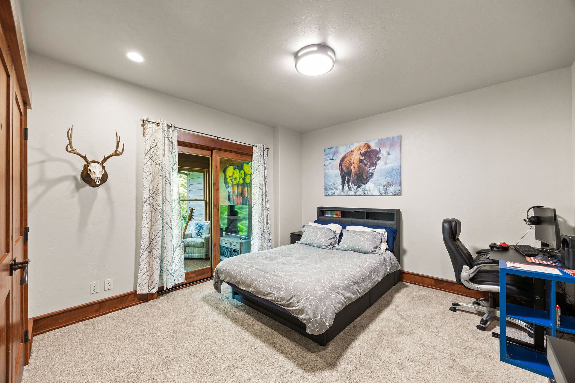 500 Wild Swan Trail, Bigfork, MT 59911 Main house guest room with screened in porch