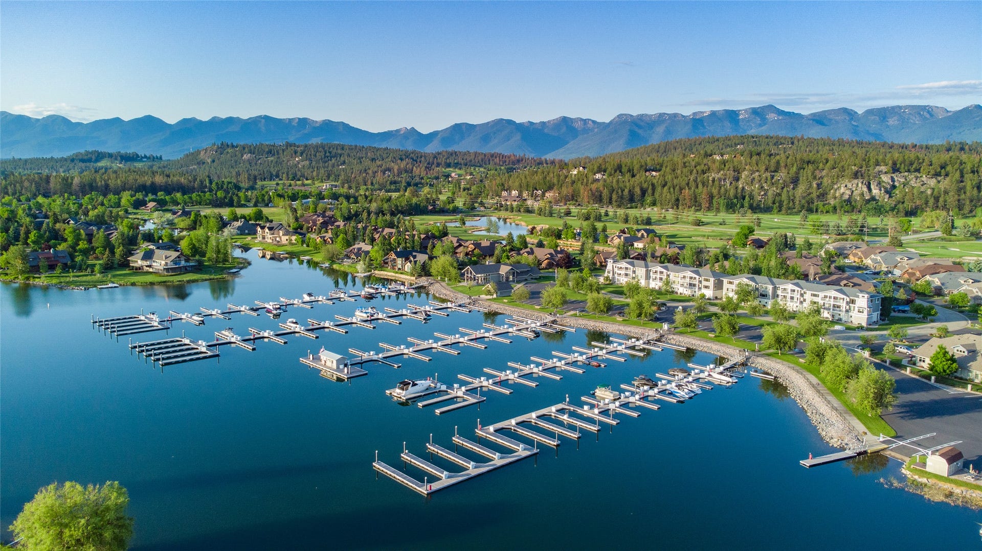 C12 Eagle Bend Yacht Harbor, Bigfork, MT 59911 Drone / aerial view with a view of trees and a water and mountain view