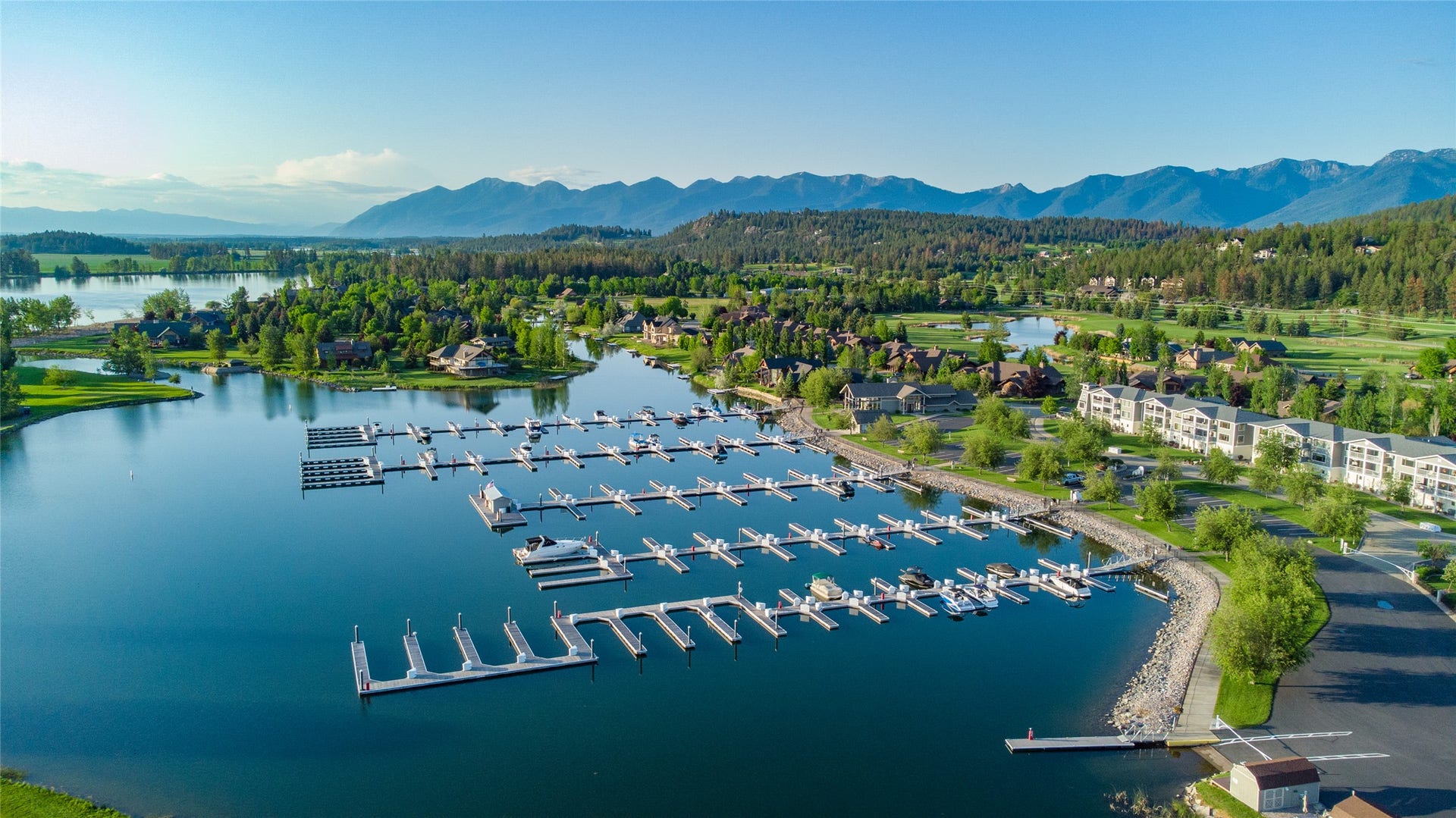 C12 Eagle Bend Yacht Harbor, Bigfork, MT 59911 Bird's eye view featuring a water and mountain view and a view of trees