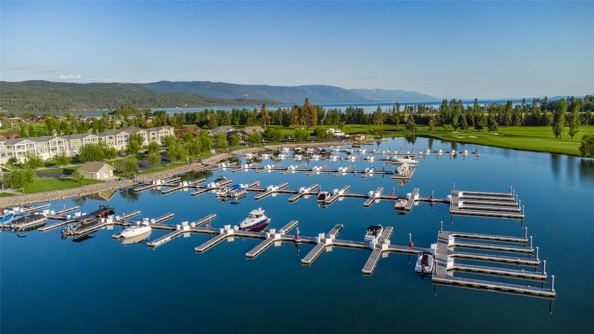 C12 Eagle Bend Yacht Harbor, Bigfork, MT 59911 Drone / aerial view with a water and mountain view