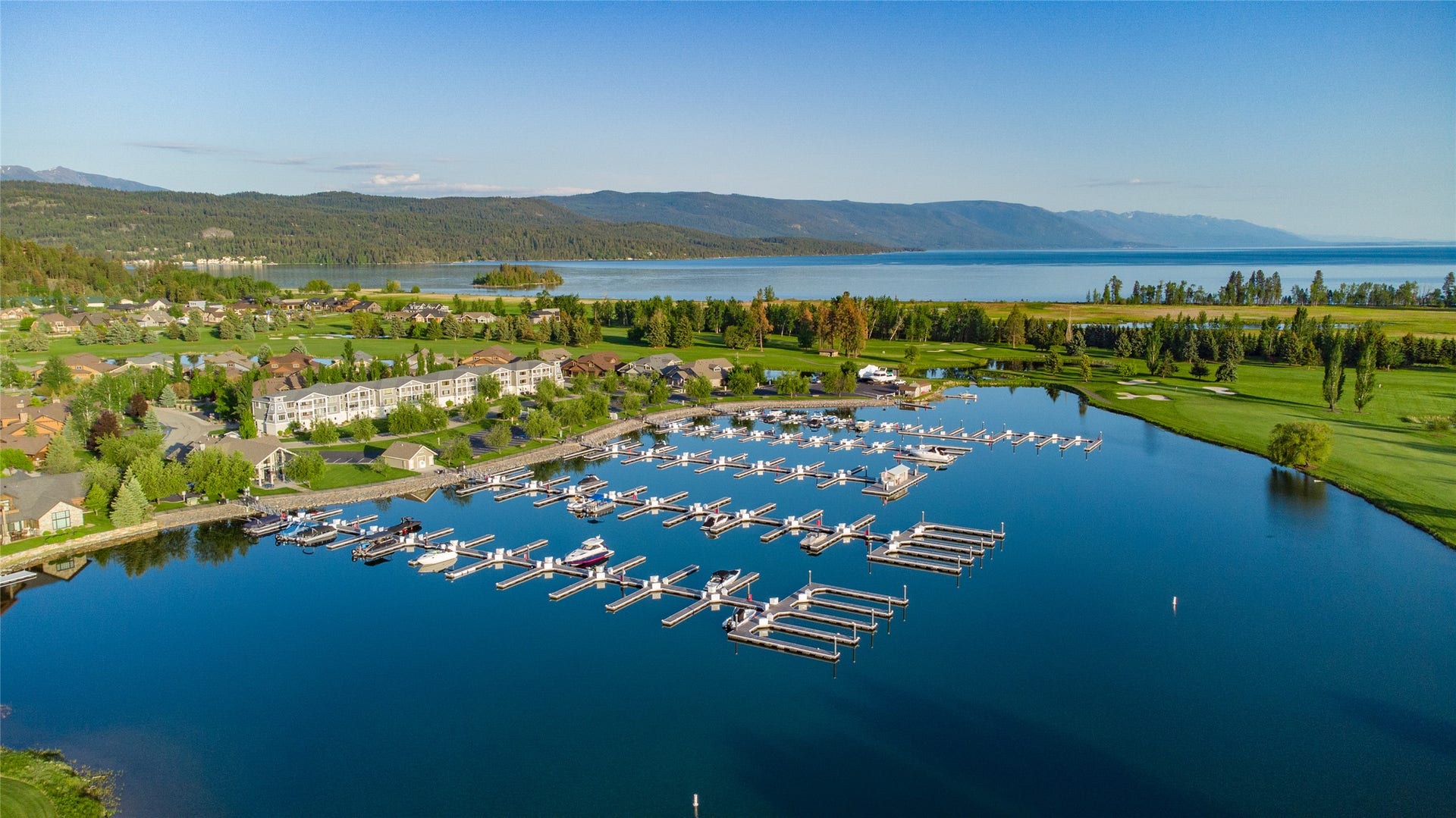 C12 Eagle Bend Yacht Harbor, Bigfork, MT 59911 Bird's eye view with a water and mountain view