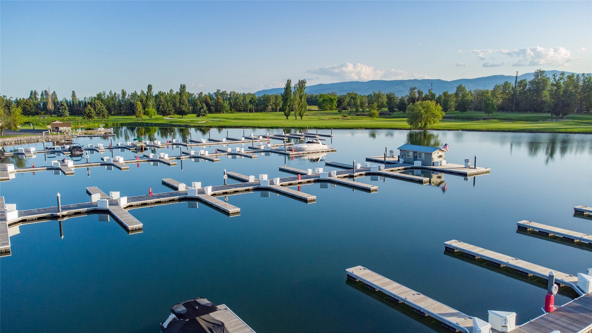 C12 Eagle Bend Yacht Harbor, Bigfork, MT 59911 Dock area with a water and mountain view