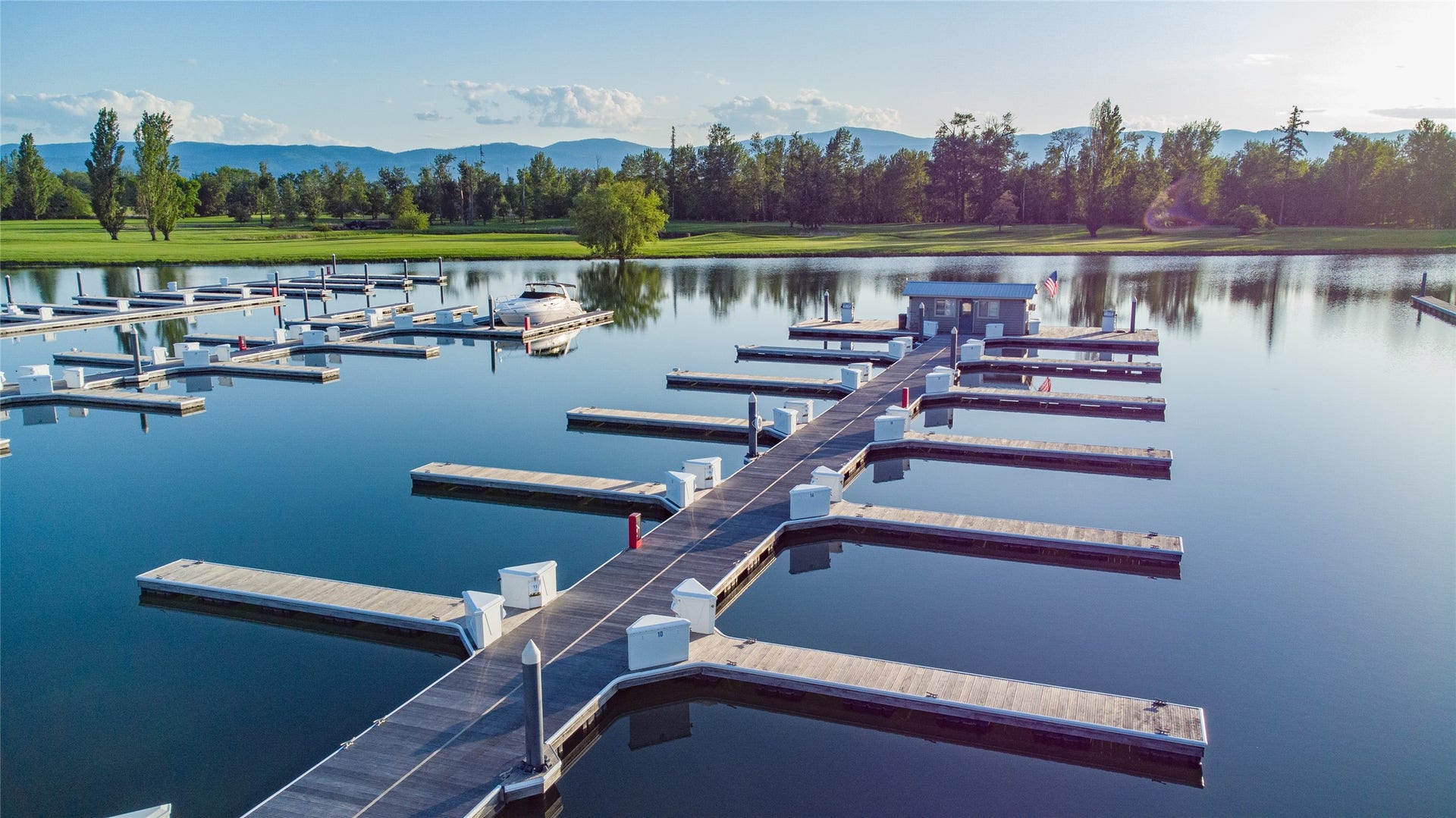 C12 Eagle Bend Yacht Harbor, Bigfork, MT 59911 View of dock with a water and mountain view