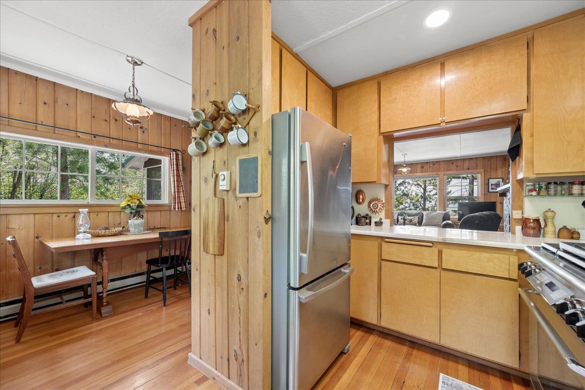 332 Flathead Lodge Road, Bigfork, MT 59911 Kitchen with breakfast table along the wall.
