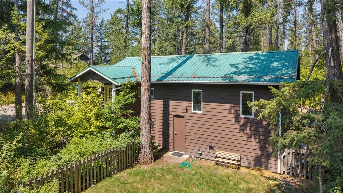 332 Flathead Lodge Road, Bigfork, MT 59911 South side of Kinderhaus with small, private fenced yard